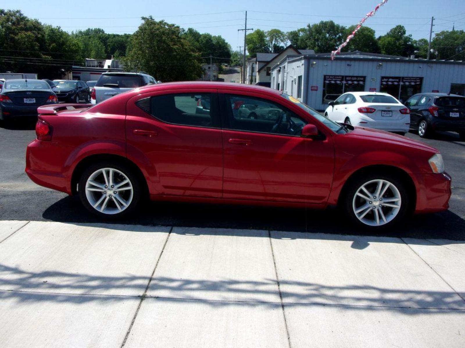 2012 RED DODGE AVENGER SXT (1C3CDZCB0CN) with an 2.4L engine, Automatic transmission, located at 501 E. Columbia St., Springfield, OH, 45503, (800) 262-7122, 39.925262, -83.801796 - Photo #0