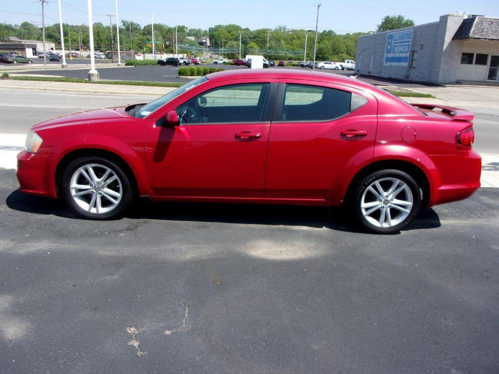 2012 RED DODGE AVENGER SXT (1C3CDZCB0CN) with an 2.4L engine, Automatic transmission, located at 501 E. Columbia St., Springfield, OH, 45503, (800) 262-7122, 39.925262, -83.801796 - Photo #1