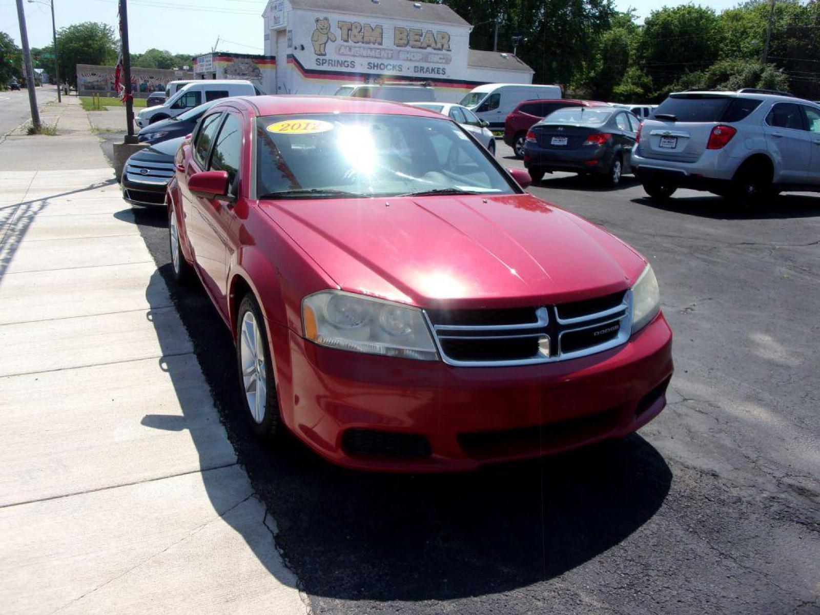 2012 RED DODGE AVENGER SXT (1C3CDZCB0CN) with an 2.4L engine, Automatic transmission, located at 501 E. Columbia St., Springfield, OH, 45503, (800) 262-7122, 39.925262, -83.801796 - Photo #3