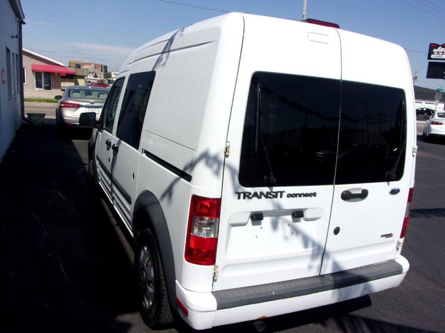 2012 WHITE FORD TRANSIT CONNECT XLT (NM0LS6BN9CT) with an 2.0L engine, Automatic transmission, located at 501 E. Columbia St., Springfield, OH, 45503, (800) 262-7122, 39.925262, -83.801796 - *** XLT *** Local Trade *** Serviced and Detailed *** Jay North Auto has offered hand picked vehicles since 1965! Our customer's enjoy a NO pressure buying experience with a small town feel. All of our vehicles get fully inspected and detailed. We are a preferred dealer for many local credit un - Photo#9