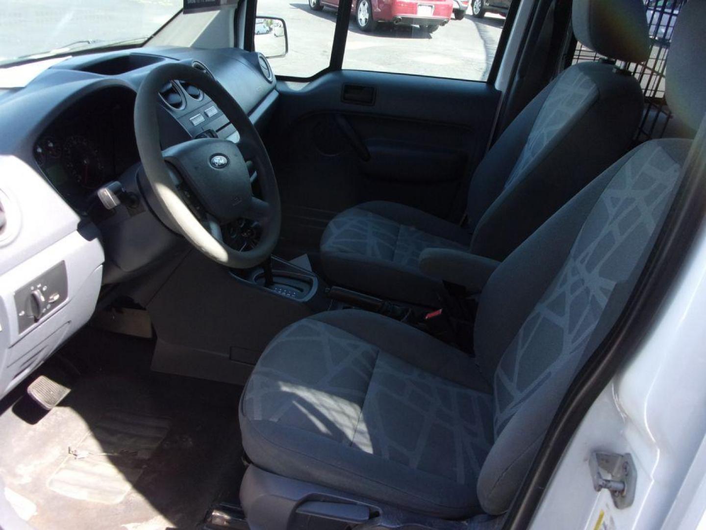 2012 WHITE FORD TRANSIT CONNECT XLT (NM0LS6BN9CT) with an 2.0L engine, Automatic transmission, located at 501 E. Columbia St., Springfield, OH, 45503, (800) 262-7122, 39.925262, -83.801796 - *** XLT *** Local Trade *** Serviced and Detailed *** Jay North Auto has offered hand picked vehicles since 1965! Our customer's enjoy a NO pressure buying experience with a small town feel. All of our vehicles get fully inspected and detailed. We are a preferred dealer for many local credit un - Photo#11