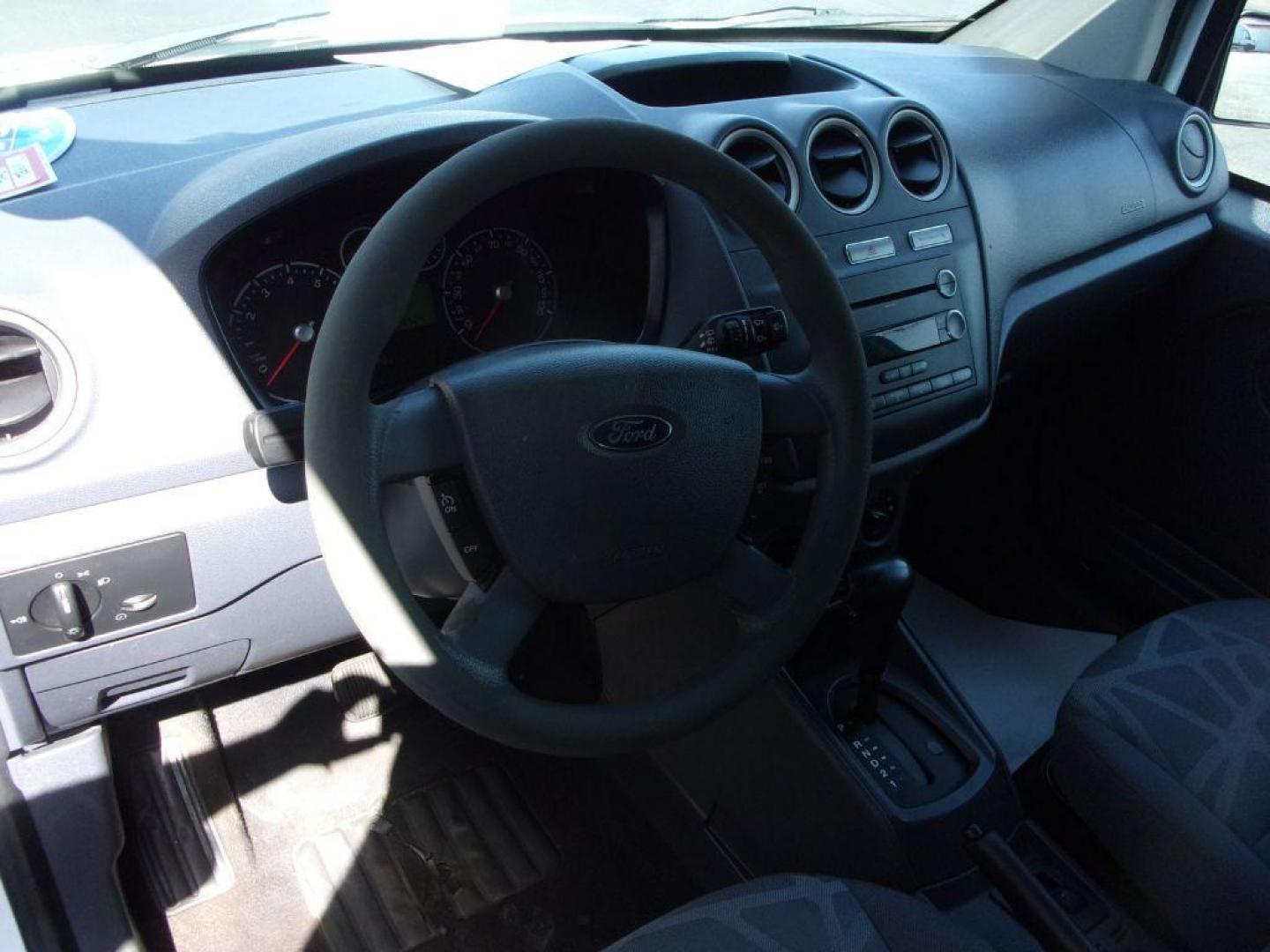 2012 WHITE FORD TRANSIT CONNECT XLT (NM0LS6BN9CT) with an 2.0L engine, Automatic transmission, located at 501 E. Columbia St., Springfield, OH, 45503, (800) 262-7122, 39.925262, -83.801796 - *** XLT *** Local Trade *** Serviced and Detailed *** Jay North Auto has offered hand picked vehicles since 1965! Our customer's enjoy a NO pressure buying experience with a small town feel. All of our vehicles get fully inspected and detailed. We are a preferred dealer for many local credit un - Photo#12