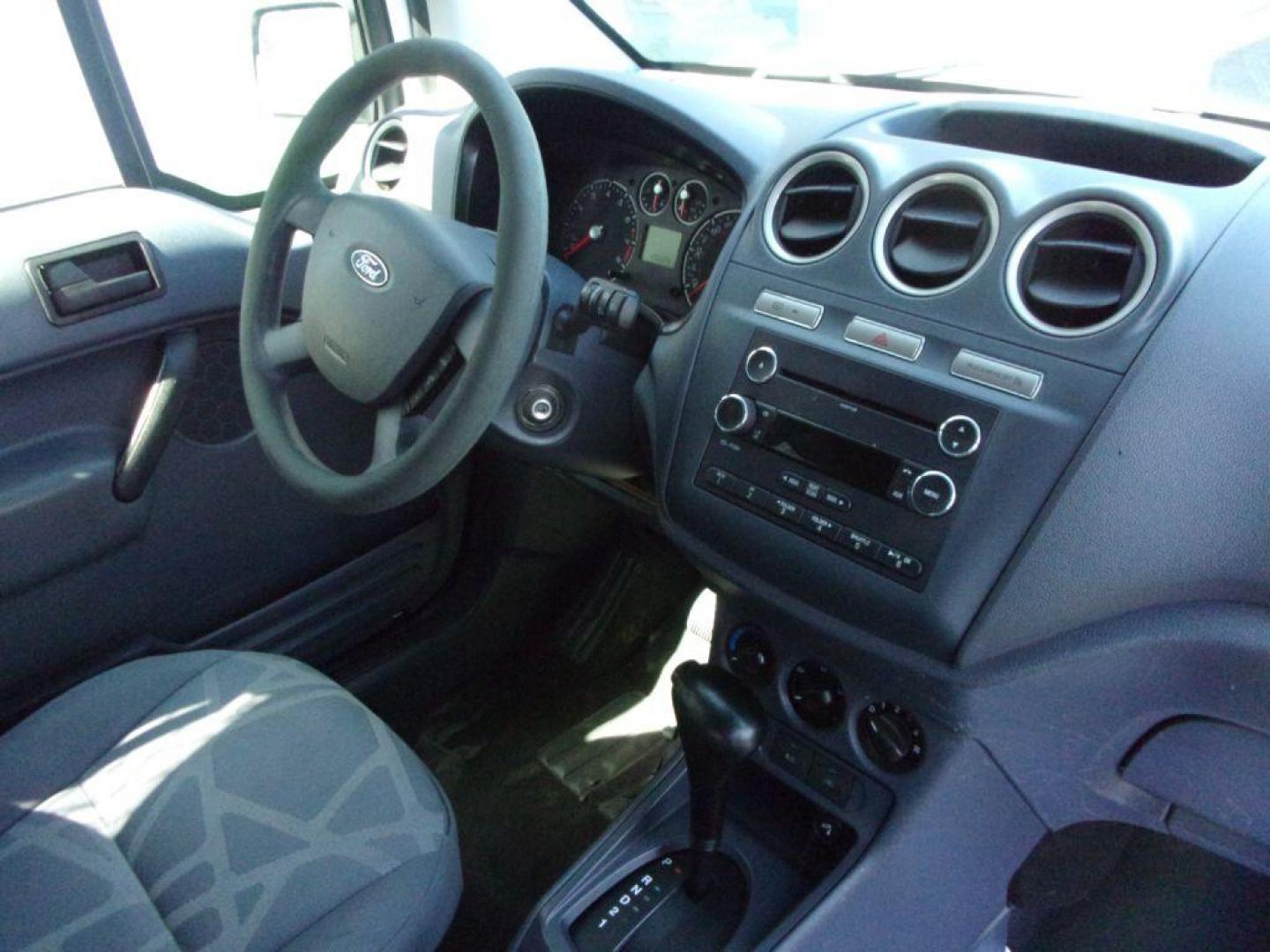 2012 WHITE FORD TRANSIT CONNECT XLT (NM0LS6BN9CT) with an 2.0L engine, Automatic transmission, located at 501 E. Columbia St., Springfield, OH, 45503, (800) 262-7122, 39.925262, -83.801796 - *** XLT *** Local Trade *** Serviced and Detailed *** Jay North Auto has offered hand picked vehicles since 1965! Our customer's enjoy a NO pressure buying experience with a small town feel. All of our vehicles get fully inspected and detailed. We are a preferred dealer for many local credit un - Photo#18