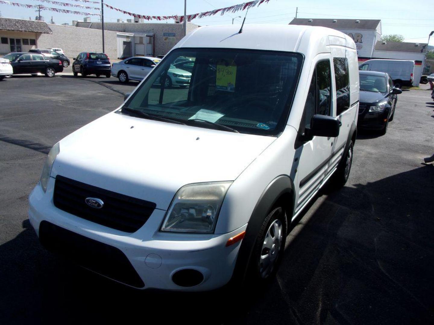 2012 WHITE FORD TRANSIT CONNECT XLT (NM0LS6BN9CT) with an 2.0L engine, Automatic transmission, located at 501 E. Columbia St., Springfield, OH, 45503, (800) 262-7122, 39.925262, -83.801796 - *** XLT *** Local Trade *** Serviced and Detailed *** Jay North Auto has offered hand picked vehicles since 1965! Our customer's enjoy a NO pressure buying experience with a small town feel. All of our vehicles get fully inspected and detailed. We are a preferred dealer for many local credit un - Photo#3