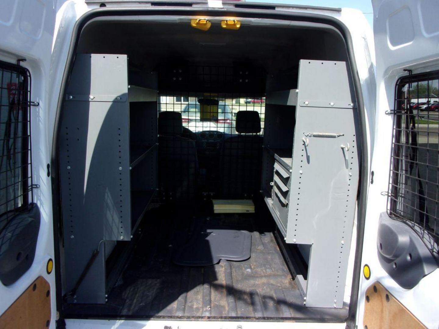 2012 WHITE FORD TRANSIT CONNECT XLT (NM0LS6BN9CT) with an 2.0L engine, Automatic transmission, located at 501 E. Columbia St., Springfield, OH, 45503, (800) 262-7122, 39.925262, -83.801796 - *** XLT *** Local Trade *** Serviced and Detailed *** Jay North Auto has offered hand picked vehicles since 1965! Our customer's enjoy a NO pressure buying experience with a small town feel. All of our vehicles get fully inspected and detailed. We are a preferred dealer for many local credit un - Photo#4