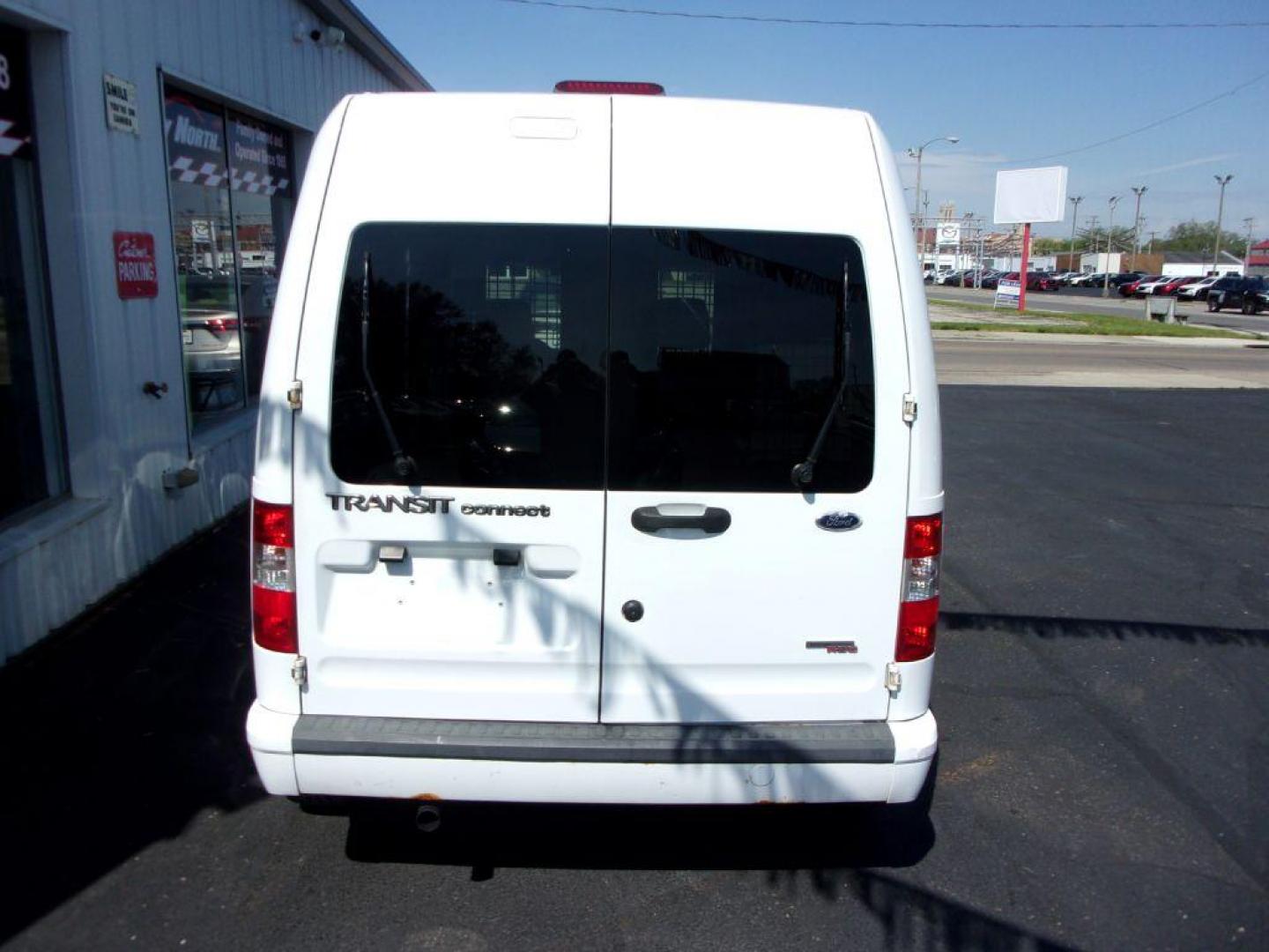 2012 WHITE FORD TRANSIT CONNECT XLT (NM0LS6BN9CT) with an 2.0L engine, Automatic transmission, located at 501 E. Columbia St., Springfield, OH, 45503, (800) 262-7122, 39.925262, -83.801796 - *** XLT *** Local Trade *** Serviced and Detailed *** Jay North Auto has offered hand picked vehicles since 1965! Our customer's enjoy a NO pressure buying experience with a small town feel. All of our vehicles get fully inspected and detailed. We are a preferred dealer for many local credit un - Photo#7