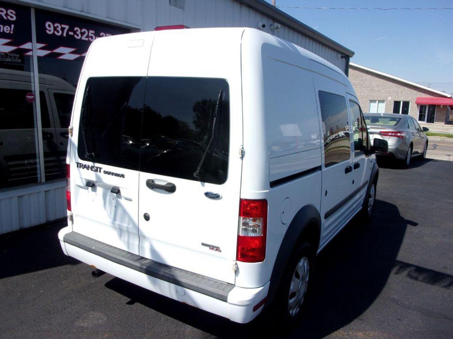 2012 WHITE FORD TRANSIT CONNECT XLT (NM0LS6BN9CT) with an 2.0L engine, Automatic transmission, located at 501 E. Columbia St., Springfield, OH, 45503, (800) 262-7122, 39.925262, -83.801796 - *** XLT *** Local Trade *** Serviced and Detailed *** Jay North Auto has offered hand picked vehicles since 1965! Our customer's enjoy a NO pressure buying experience with a small town feel. All of our vehicles get fully inspected and detailed. We are a preferred dealer for many local credit un - Photo#8