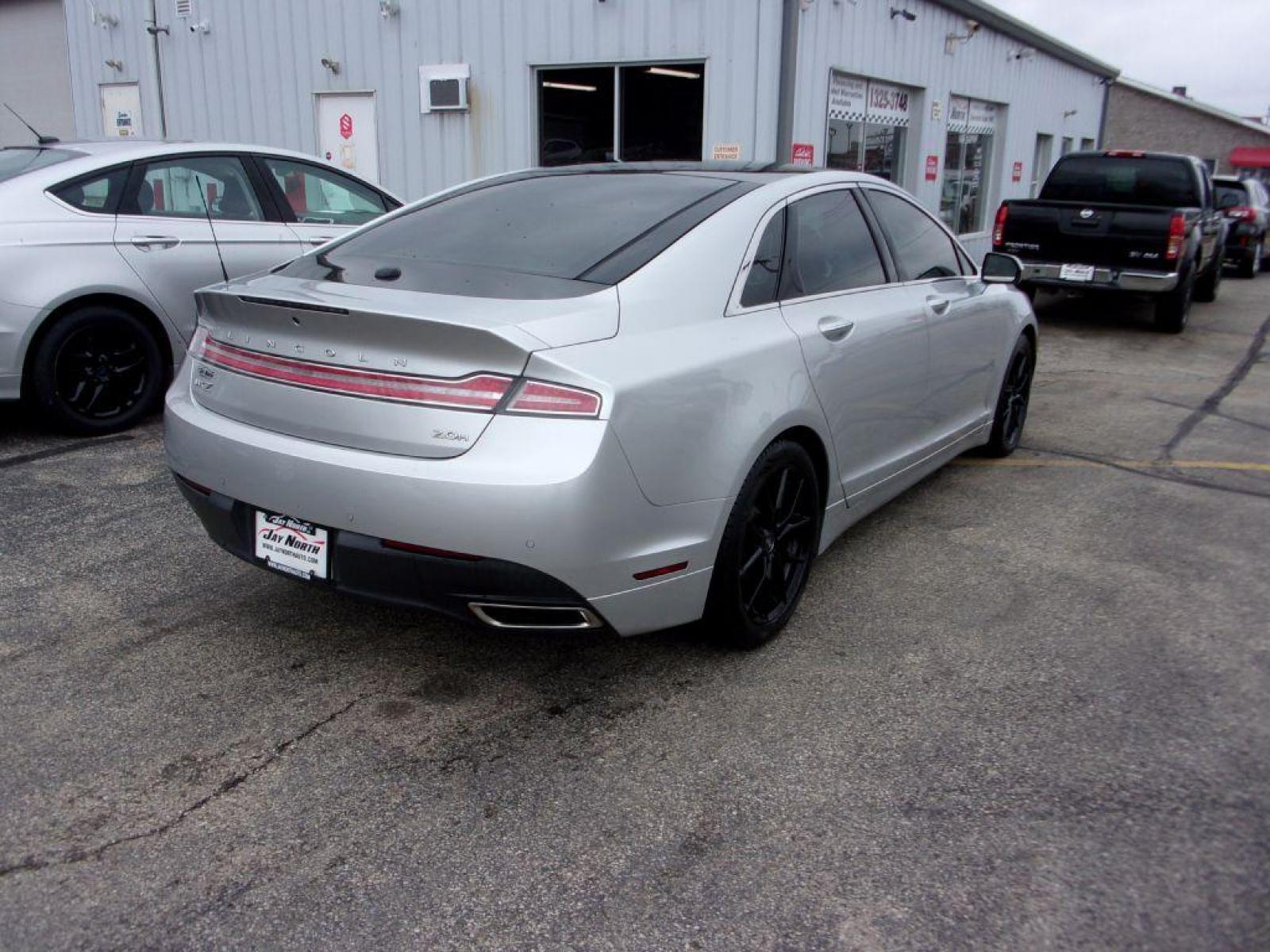 2014 SILVER LINCOLN MKZ HYBRID (3LN6L2LU0ER) with an 2.0L engine, Continuously Variable transmission, located at 501 E. Columbia St., Springfield, OH, 45503, (800) 262-7122, 39.925262, -83.801796 - *** Please call for Availability ***Clean Carfax***SHARP***Hybrid***Heated and Cooled Leather Seating***Navigation***Heated Steering Wheel***Panoramic Moon Roof***THX Stereo***Serviced and Detailed*** Jay North Auto has offered hand picked vehicles since 1965! Our customer's enjoy a NO pressure b - Photo #3
