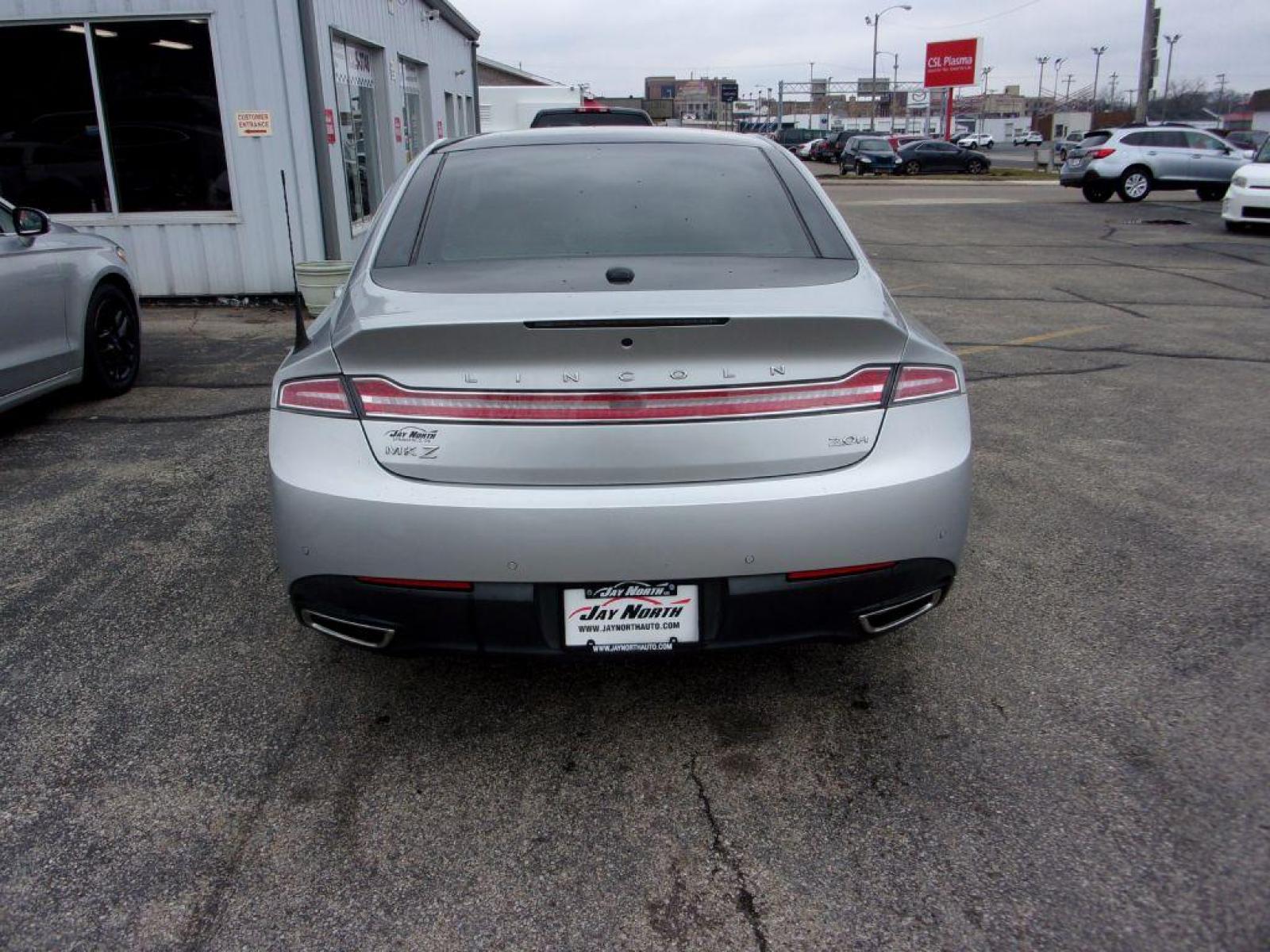 2014 SILVER LINCOLN MKZ HYBRID (3LN6L2LU0ER) with an 2.0L engine, Continuously Variable transmission, located at 501 E. Columbia St., Springfield, OH, 45503, (800) 262-7122, 39.925262, -83.801796 - *** Please call for Availability ***Clean Carfax***SHARP***Hybrid***Heated and Cooled Leather Seating***Navigation***Heated Steering Wheel***Panoramic Moon Roof***THX Stereo***Serviced and Detailed*** Jay North Auto has offered hand picked vehicles since 1965! Our customer's enjoy a NO pressure b - Photo #4