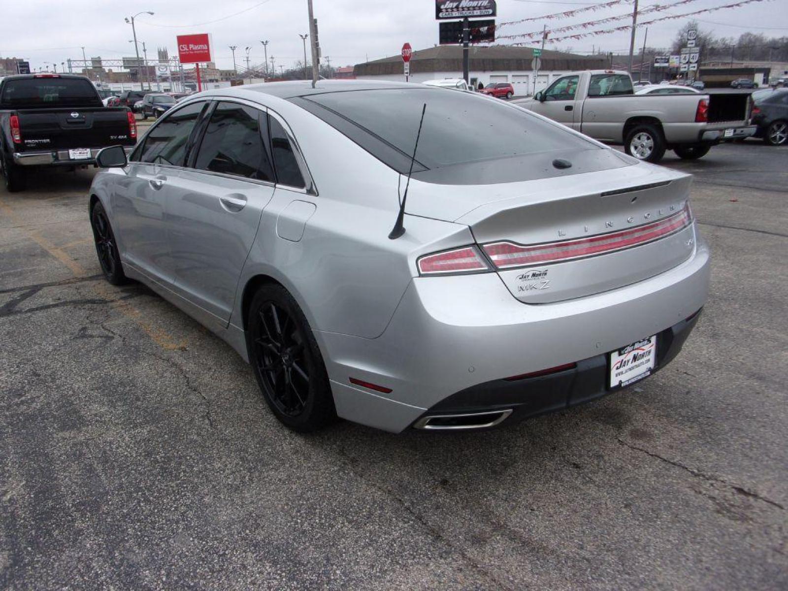 2014 SILVER LINCOLN MKZ HYBRID (3LN6L2LU0ER) with an 2.0L engine, Continuously Variable transmission, located at 501 E. Columbia St., Springfield, OH, 45503, (800) 262-7122, 39.925262, -83.801796 - *** Please call for Availability ***Clean Carfax***SHARP***Hybrid***Heated and Cooled Leather Seating***Navigation***Heated Steering Wheel***Panoramic Moon Roof***THX Stereo***Serviced and Detailed*** Jay North Auto has offered hand picked vehicles since 1965! Our customer's enjoy a NO pressure b - Photo #5