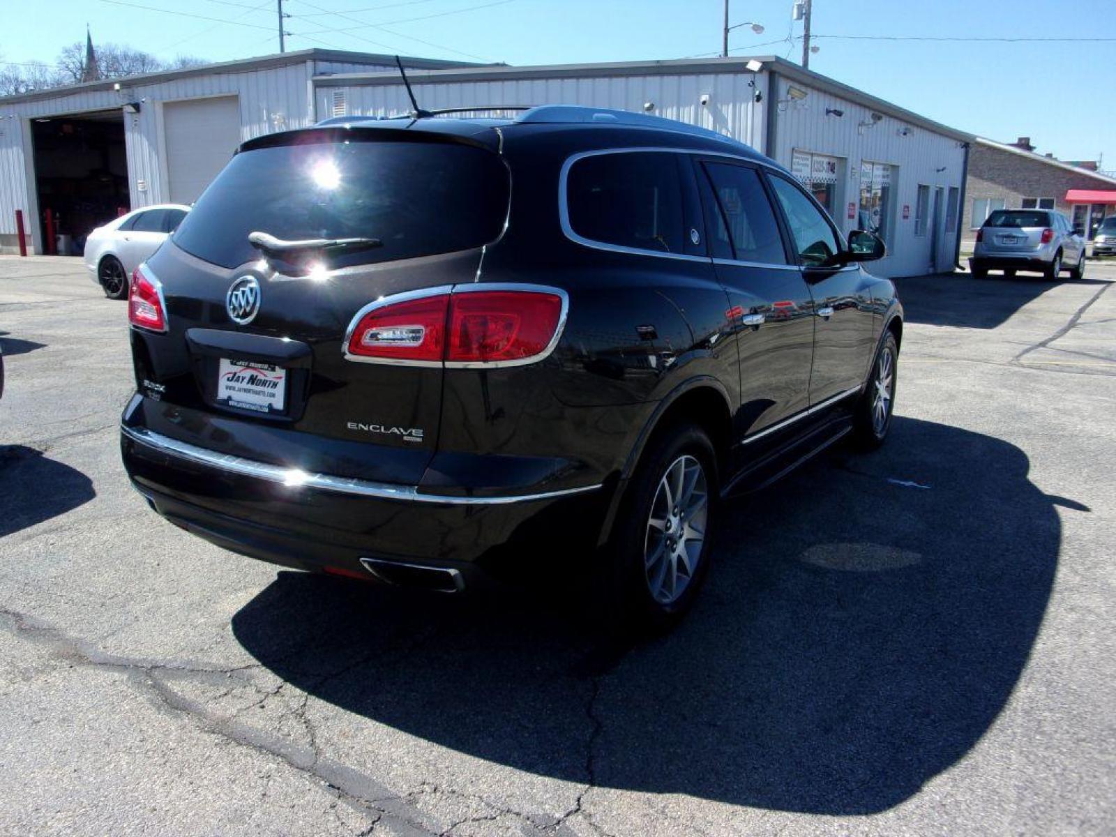 2013 BRONZE BUICK ENCLAVE LEATHER PACKAGE (5GAKVCKD9DJ) with an 3.6L engine, Automatic transmission, located at 501 E. Columbia St., Springfield, OH, 45503, (800) 262-7122, 39.925262, -83.801796 - ***LOADED***Heated Leather Seating***Back-up Camera***Power Lift Gate***3rd Row Seating***Serviced and Detailed*** Jay North Auto has offered hand picked vehicles since 1965! Our customer's enjoy a NO pressure buying experience with a small town feel. All of our vehicles get fully inspected and - Photo #3