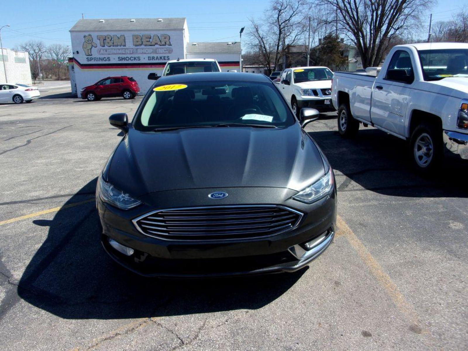 2017 GRAY FORD FUSION SE HYBRID (3FA6P0LU3HR) with an 2.0L engine, Continuously Variable transmission, located at 501 E. Columbia St., Springfield, OH, 45503, (800) 262-7122, 39.925262, -83.801796 - ***Hybrid***SE***New Tires***Back-up Camera***SHARP*** Jay North Auto has offered hand picked vehicles since 1965! Our customer's enjoy a NO pressure buying experience with a small town feel. All of our vehicles get fully inspected and detailed. We are a preferred dealer for many local credit un - Photo #1