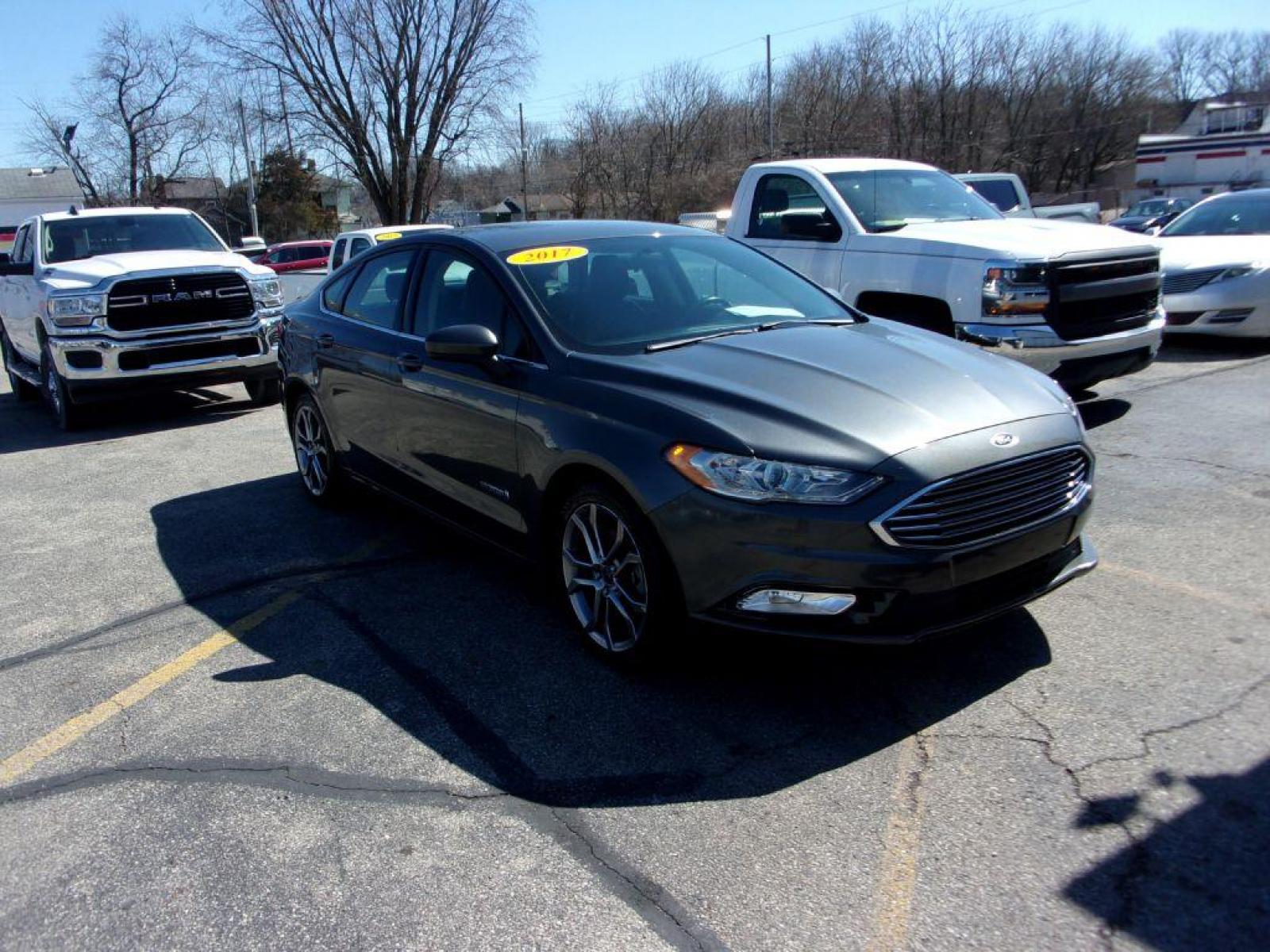 2017 GRAY FORD FUSION SE HYBRID (3FA6P0LU3HR) with an 2.0L engine, Continuously Variable transmission, located at 501 E. Columbia St., Springfield, OH, 45503, (800) 262-7122, 39.925262, -83.801796 - ***Hybrid***SE***New Tires***Back-up Camera***SHARP*** Jay North Auto has offered hand picked vehicles since 1965! Our customer's enjoy a NO pressure buying experience with a small town feel. All of our vehicles get fully inspected and detailed. We are a preferred dealer for many local credit un - Photo #2