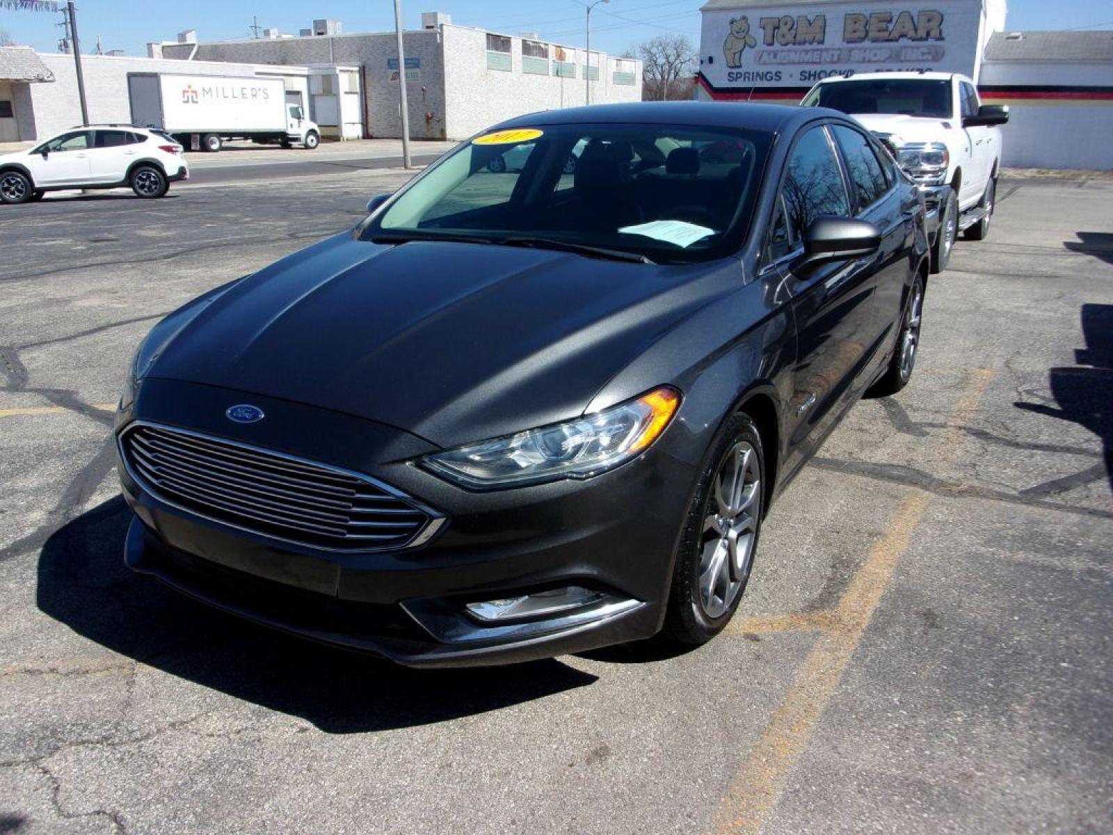 2017 GRAY FORD FUSION SE HYBRID (3FA6P0LU3HR) with an 2.0L engine, Continuously Variable transmission, located at 501 E. Columbia St., Springfield, OH, 45503, (800) 262-7122, 39.925262, -83.801796 - ***Hybrid***SE***New Tires***Back-up Camera***SHARP*** Jay North Auto has offered hand picked vehicles since 1965! Our customer's enjoy a NO pressure buying experience with a small town feel. All of our vehicles get fully inspected and detailed. We are a preferred dealer for many local credit un - Photo #6