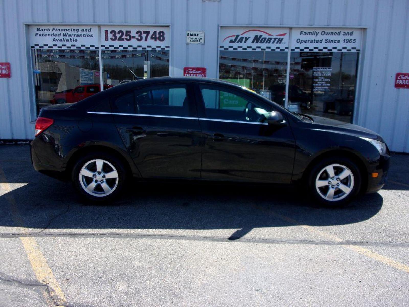 2014 BLACK CHEVROLET CRUZE LT (1G1PC5SB5E7) with an 1.4L engine, Automatic transmission, located at 501 E. Columbia St., Springfield, OH, 45503, (800) 262-7122, 39.925262, -83.801796 - *** LT *** Serviced and Detailed *** Check it out!!! *** Jay North Auto has offered hand picked vehicles since 1965! Our customer's enjoy a NO pressure buying experience with a small town feel. All of our vehicles get fully inspected and detailed. We are a preferred dealer for many local credit - Photo #0