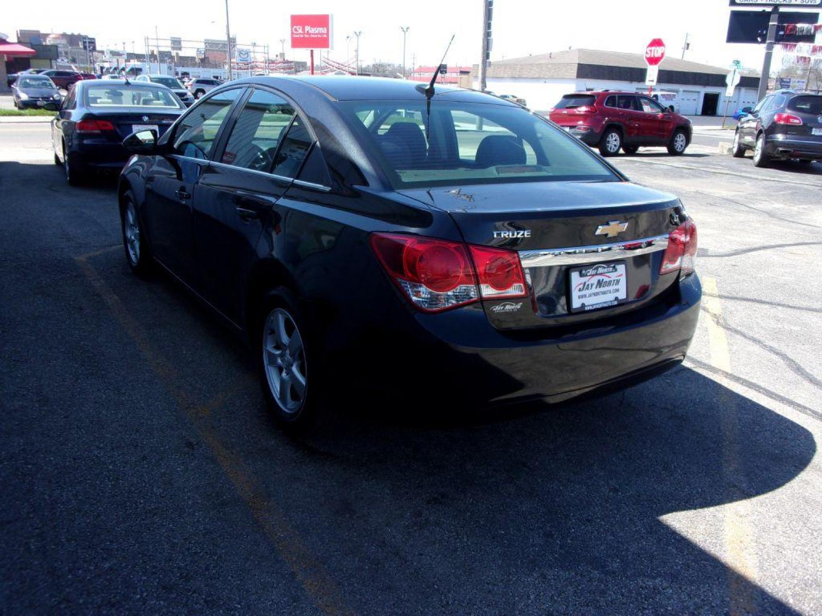 2014 BLACK CHEVROLET CRUZE LT (1G1PC5SB5E7) with an 1.4L engine, Automatic transmission, located at 501 E. Columbia St., Springfield, OH, 45503, (800) 262-7122, 39.925262, -83.801796 - *** LT *** Serviced and Detailed *** Check it out!!! *** Jay North Auto has offered hand picked vehicles since 1965! Our customer's enjoy a NO pressure buying experience with a small town feel. All of our vehicles get fully inspected and detailed. We are a preferred dealer for many local credit - Photo #4