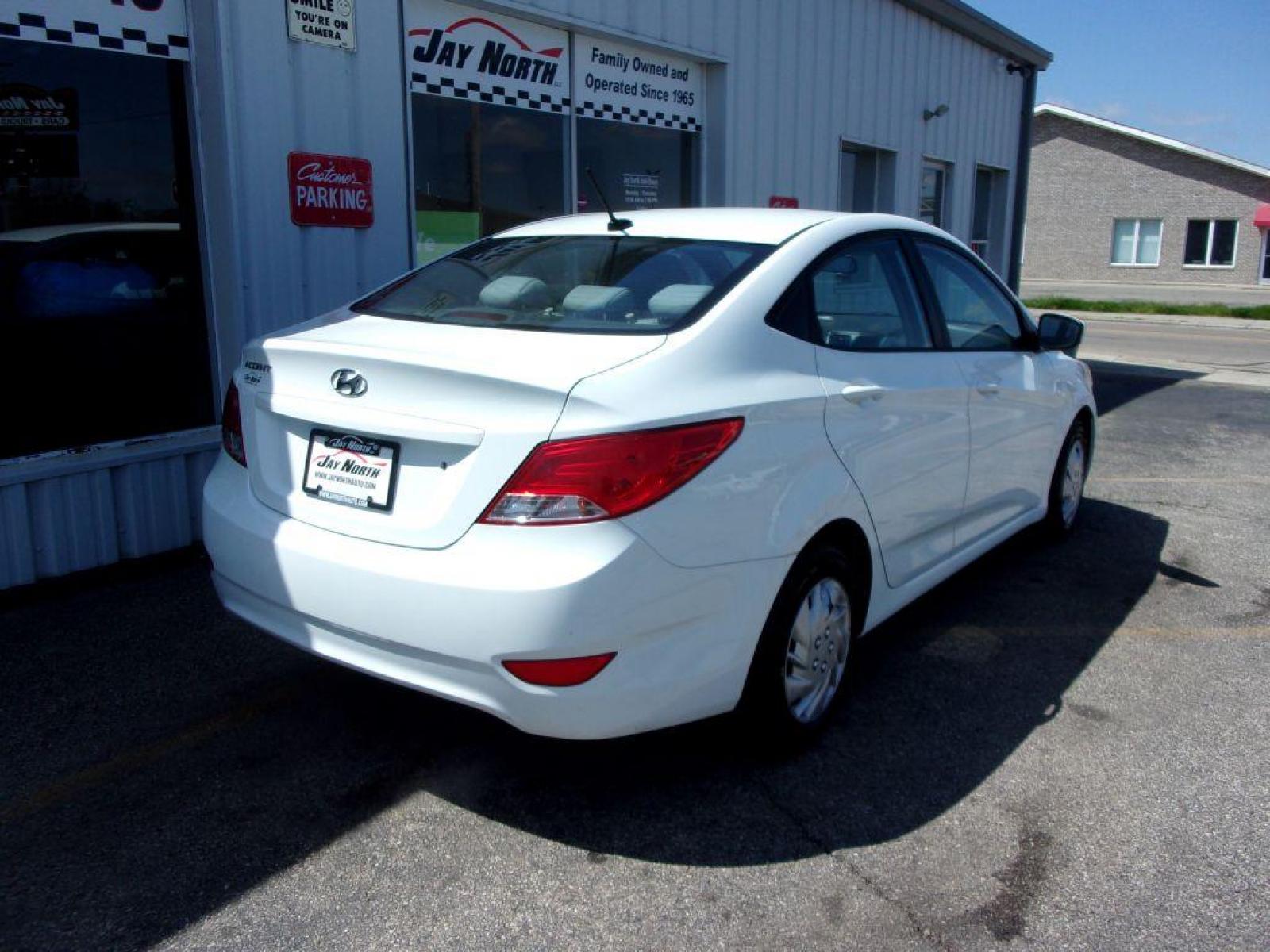2015 WHITE HYUNDAI ACCENT GLS (KMHCT4AE2FU) with an 1.6L engine, Automatic transmission, located at 501 E. Columbia St., Springfield, OH, 45503, (800) 262-7122, 39.925262, -83.801796 - *** New Tires *** Serviced and Detailed *** Automatic *** Power Windows and Locks *** Jay North Auto has offered hand picked vehicles since 1965! Our customer's enjoy a NO pressure buying experience with a small town feel. All of our vehicles get fully inspected and detailed. We are a preferred - Photo #3