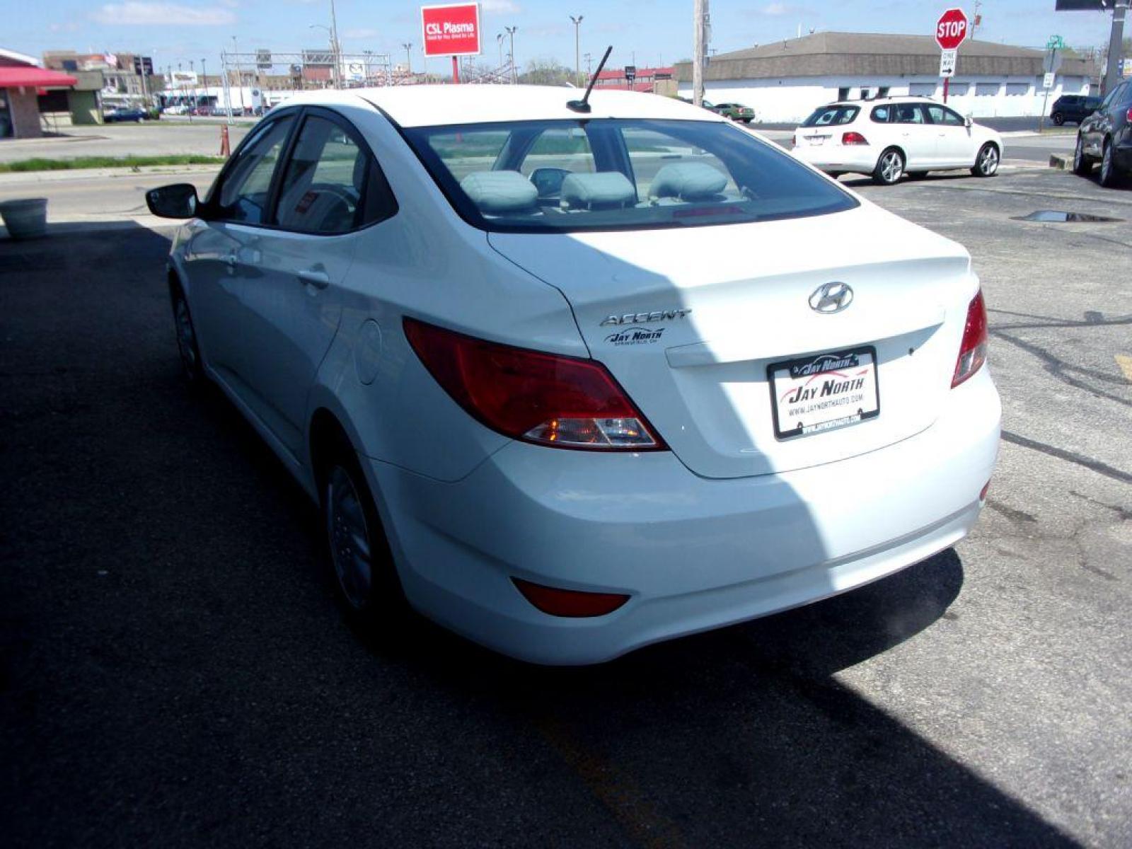 2015 WHITE HYUNDAI ACCENT GLS (KMHCT4AE2FU) with an 1.6L engine, Automatic transmission, located at 501 E. Columbia St., Springfield, OH, 45503, (800) 262-7122, 39.925262, -83.801796 - *** New Tires *** Serviced and Detailed *** Automatic *** Power Windows and Locks *** Jay North Auto has offered hand picked vehicles since 1965! Our customer's enjoy a NO pressure buying experience with a small town feel. All of our vehicles get fully inspected and detailed. We are a preferred - Photo #5