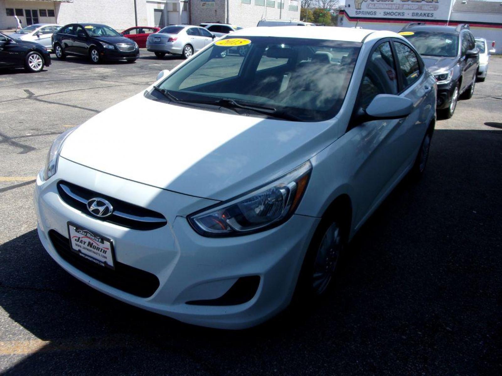 2015 WHITE HYUNDAI ACCENT GLS (KMHCT4AE2FU) with an 1.6L engine, Automatic transmission, located at 501 E. Columbia St., Springfield, OH, 45503, (800) 262-7122, 39.925262, -83.801796 - *** New Tires *** Serviced and Detailed *** Automatic *** Power Windows and Locks *** Jay North Auto has offered hand picked vehicles since 1965! Our customer's enjoy a NO pressure buying experience with a small town feel. All of our vehicles get fully inspected and detailed. We are a preferred - Photo #6