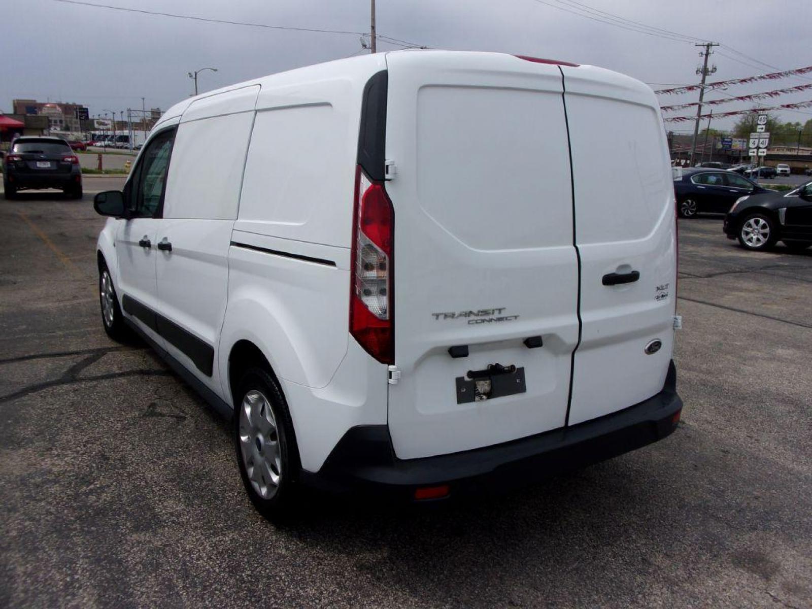 2016 WHITE FORD TRANSIT CONNECT XLT (NM0LS7F7XG1) with an 2.5L engine, Automatic transmission, located at 501 E. Columbia St., Springfield, OH, 45503, (800) 262-7122, 39.925262, -83.801796 - *** 1 Owner *** 27 Service History Records *** XLT *** Jay North Auto has offered hand picked vehicles since 1965! Our customer's enjoy a NO pressure buying experience with a small town feel. All of our vehicles get fully inspected and detailed. We are a preferred dealer for many local credit u - Photo #5
