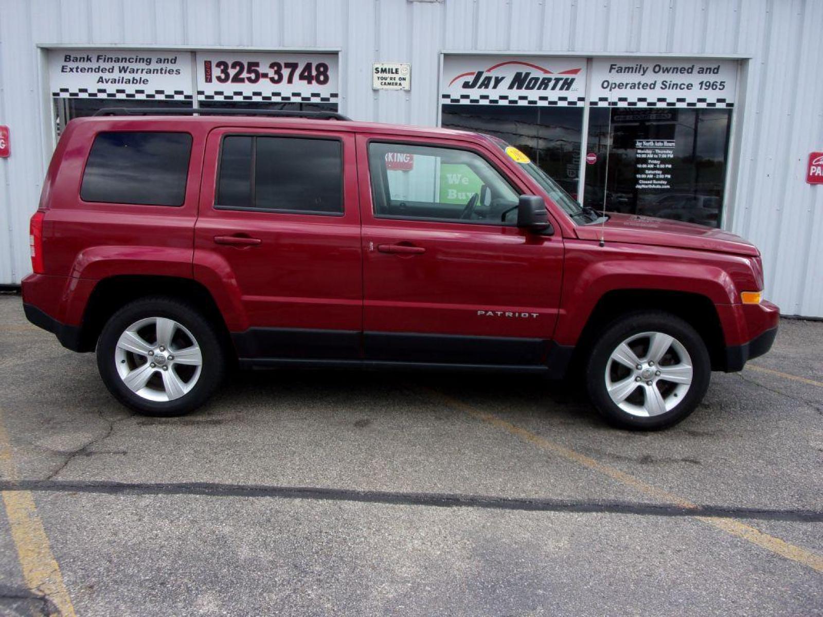 2015 RED JEEP PATRIOT LATITUDE (1C4NJRFB3FD) with an 2.4L engine, Continuously Variable transmission, located at 501 E. Columbia St., Springfield, OH, 45503, (800) 262-7122, 39.925262, -83.801796 - Photo #0