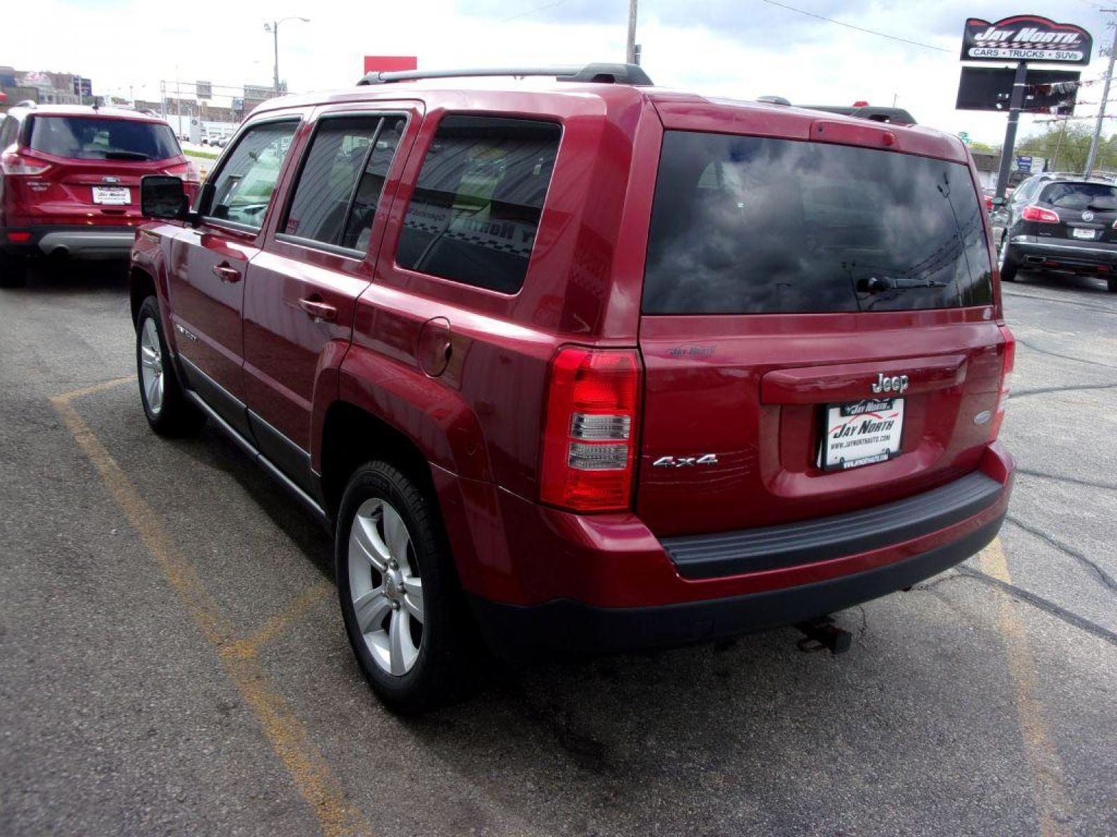 2015 RED JEEP PATRIOT LATITUDE (1C4NJRFB3FD) with an 2.4L engine, Continuously Variable transmission, located at 501 E. Columbia St., Springfield, OH, 45503, (800) 262-7122, 39.925262, -83.801796 - Photo #4