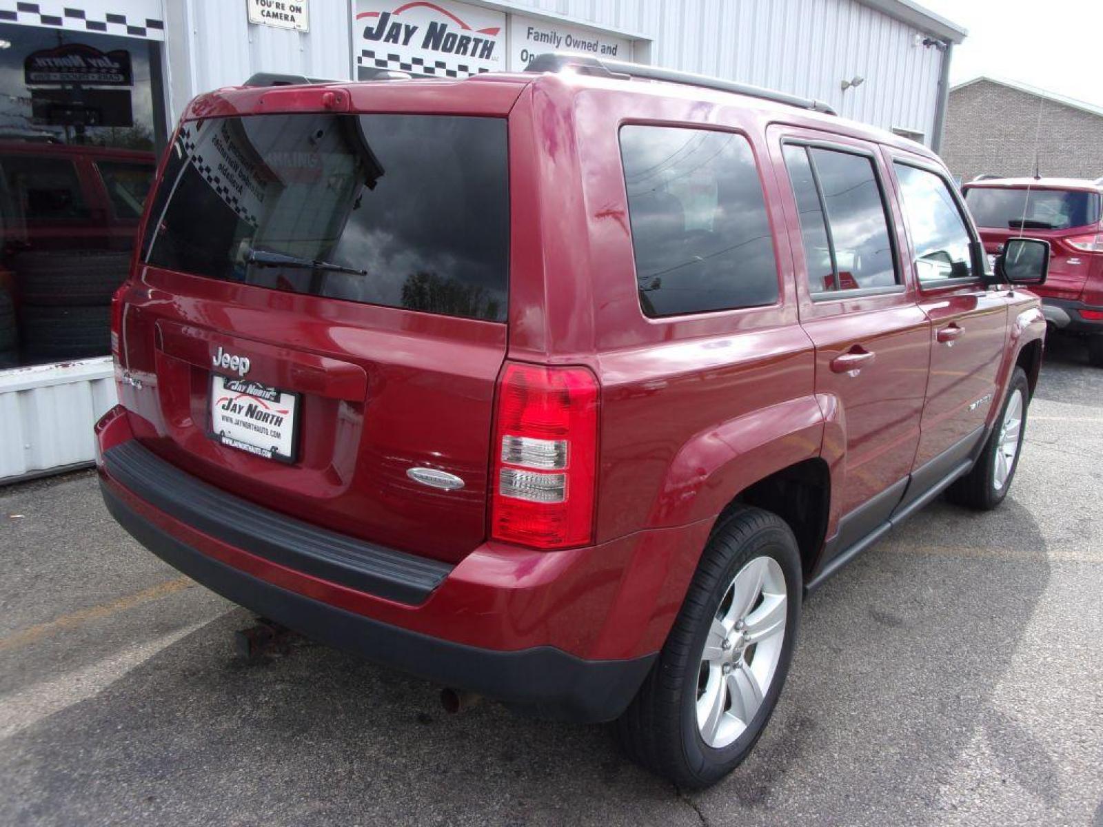 2015 RED JEEP PATRIOT LATITUDE (1C4NJRFB3FD) with an 2.4L engine, Continuously Variable transmission, located at 501 E. Columbia St., Springfield, OH, 45503, (800) 262-7122, 39.925262, -83.801796 - Photo #5