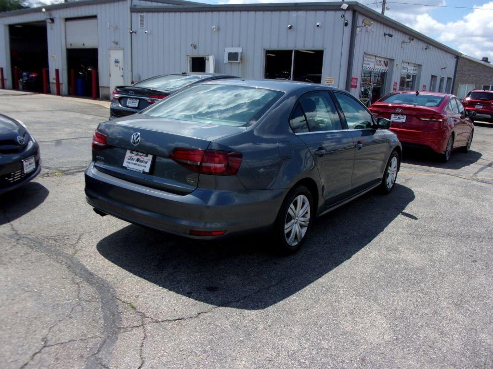 2017 GRAY VOLKSWAGEN JETTA S (3VW2B7AJ0HM) with an 1.4L engine, Automatic transmission, located at 501 E. Columbia St., Springfield, OH, 45503, (800) 262-7122, 39.925262, -83.801796 - ***Low Miles***Only 67k Miles***Gas Saver***Serviced and Detailed*** Jay North Auto has offered hand picked vehicles since 1965! Our customer's enjoy a NO pressure buying experience with a small town feel. All of our vehicles get fully inspected and detailed. We are a preferred dealer for many l - Photo #3