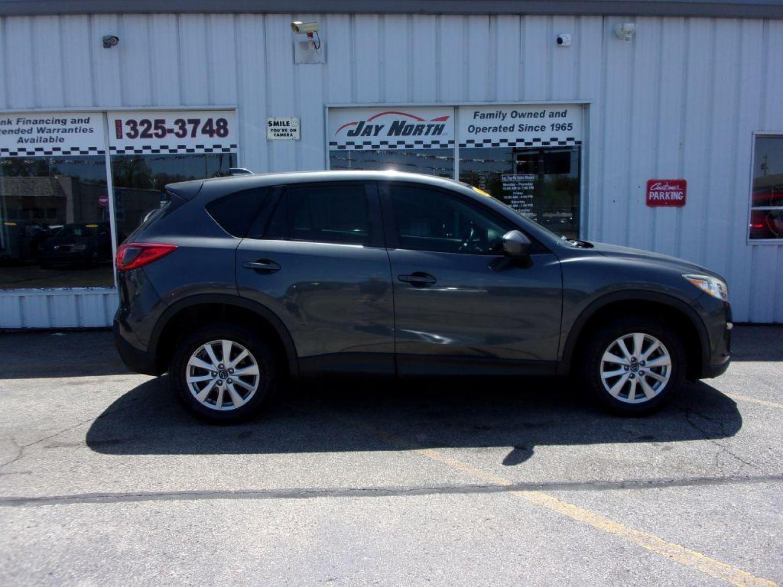2014 GRAY MAZDA CX-5 SPORT (JM3KE2BEXE0) with an 2.0L engine, 6-Speed Manual transmission, located at 501 E. Columbia St., Springfield, OH, 45503, (800) 262-7122, 39.925262, -83.801796 - *** 6 - Speed Manual ** Sport *** Serviced and Detailed *** FWD *** 2.0L *** Jay North Auto has offered hand picked vehicles since 1965! Our customer's enjoy a NO pressure buying experience with a small town feel. All of our vehicles get fully inspected and detailed. We are a preferred dealer f - Photo #0
