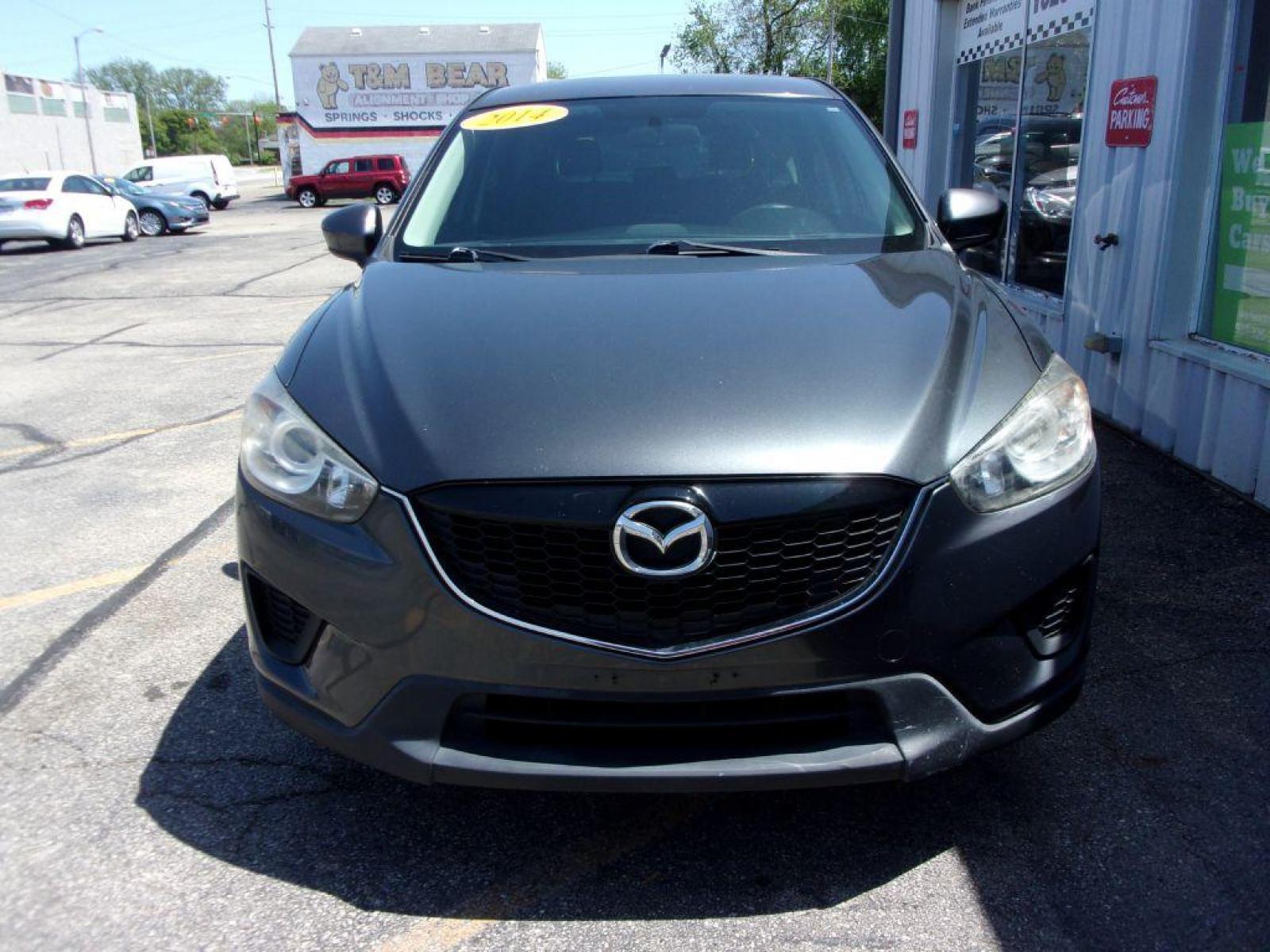 2014 GRAY MAZDA CX-5 SPORT (JM3KE2BEXE0) with an 2.0L engine, 6-Speed Manual transmission, located at 501 E. Columbia St., Springfield, OH, 45503, (800) 262-7122, 39.925262, -83.801796 - *** 6 - Speed Manual ** Sport *** Serviced and Detailed *** FWD *** 2.0L *** Jay North Auto has offered hand picked vehicles since 1965! Our customer's enjoy a NO pressure buying experience with a small town feel. All of our vehicles get fully inspected and detailed. We are a preferred dealer f - Photo #1