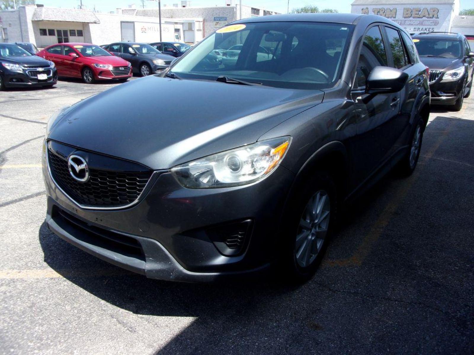 2014 GRAY MAZDA CX-5 SPORT (JM3KE2BEXE0) with an 2.0L engine, 6-Speed Manual transmission, located at 501 E. Columbia St., Springfield, OH, 45503, (800) 262-7122, 39.925262, -83.801796 - *** 6 - Speed Manual ** Sport *** Serviced and Detailed *** FWD *** 2.0L *** Jay North Auto has offered hand picked vehicles since 1965! Our customer's enjoy a NO pressure buying experience with a small town feel. All of our vehicles get fully inspected and detailed. We are a preferred dealer f - Photo #6