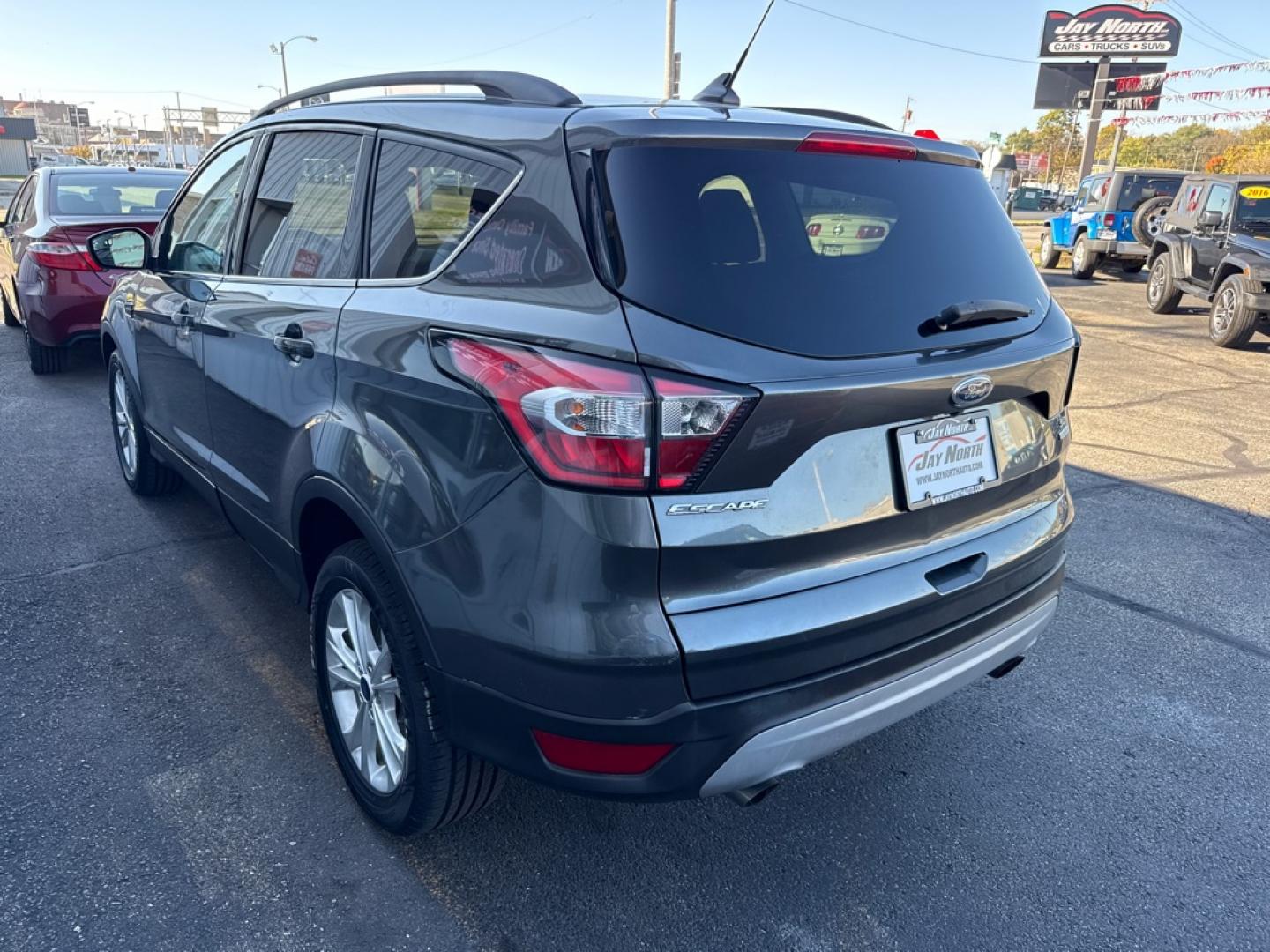 2018 GRAY FORD ESCAPE SE (1FMCU0GD8JU) with an 1.5L engine, Automatic transmission, located at 501 E. Columbia St., Springfield, OH, 45503, (800) 262-7122, 39.925262, -83.801796 - Jay North Auto has offered hand picked vehicles since 1965! Our customer's enjoy a NO pressure buying experience with a small town feel. We are a preferred dealer for many local credit unions and lenders. Bad credit? No Credit/First time buyer? Open or closed BANKRUPTCY 7 or 13? We Can Help Apply- Photo#3