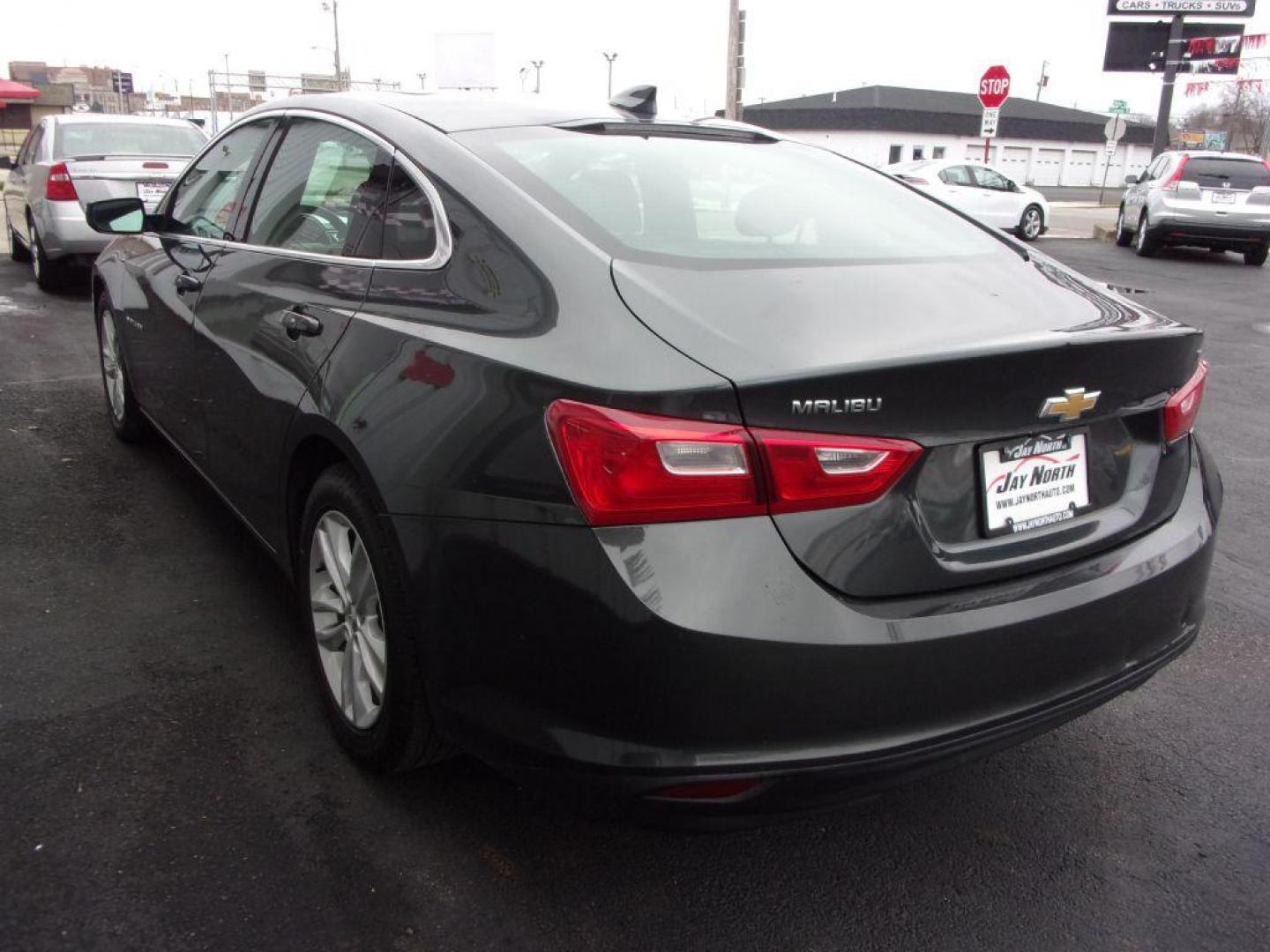 2018 GRAY CHEVROLET MALIBU LT (1G1ZD5ST2JF) with an 1.5L engine, Automatic transmission, located at 501 E. Columbia St., Springfield, OH, 45503, (800) 262-7122, 39.925262, -83.801796 - ***Clean Carfax***LT***Moonroof***Back-up Camera***84K Miles***Serviced and Detailed*** Jay North Auto has offered hand picked vehicles since 1965! Our customer's enjoy a NO pressure buying experience with a small town feel. All of our vehicles get fully inspected and detailed. We are a preferre - Photo#5