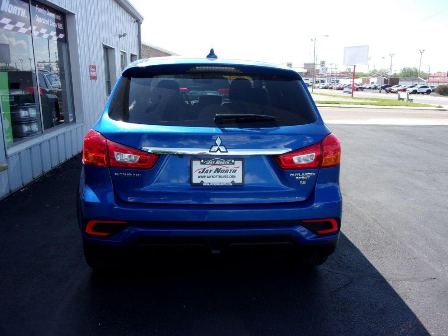 2018 BLUE MITSUBISHI OUTLANDER SPORT SE (JA4AP3AW1JU) with an 2.4L engine, Continuously Variable transmission, located at 501 E. Columbia St., Springfield, OH, 45503, (800) 262-7122, 39.925262, -83.801796 - ***Clean Carfax***Outlander Sport***Heated Seats***Carplay and Android Auto***Back-up Camera***New Brakes***Serviced and Detailed*** Jay North Auto has offered hand picked vehicles since 1965! Our customer's enjoy a NO pressure buying experience with a small town feel. All of our vehicles get fu - Photo#4