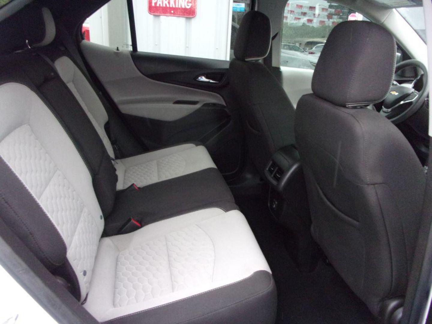 2020 WHITE CHEVROLET EQUINOX LS (2GNAXHEV0L6) with an 1.5L engine, Automatic transmission, located at 501 E. Columbia St., Springfield, OH, 45503, (800) 262-7122, 39.925262, -83.801796 - *** LS *** FWD *** Serviced and Detailed *** Power Seat *** Jay North Auto has offered hand picked vehicles since 1965! Our customer's enjoy a NO pressure buying experience with a small town feel. All of our vehicles get fully inspected and detailed. We are a preferred dealer for many local cred - Photo#16