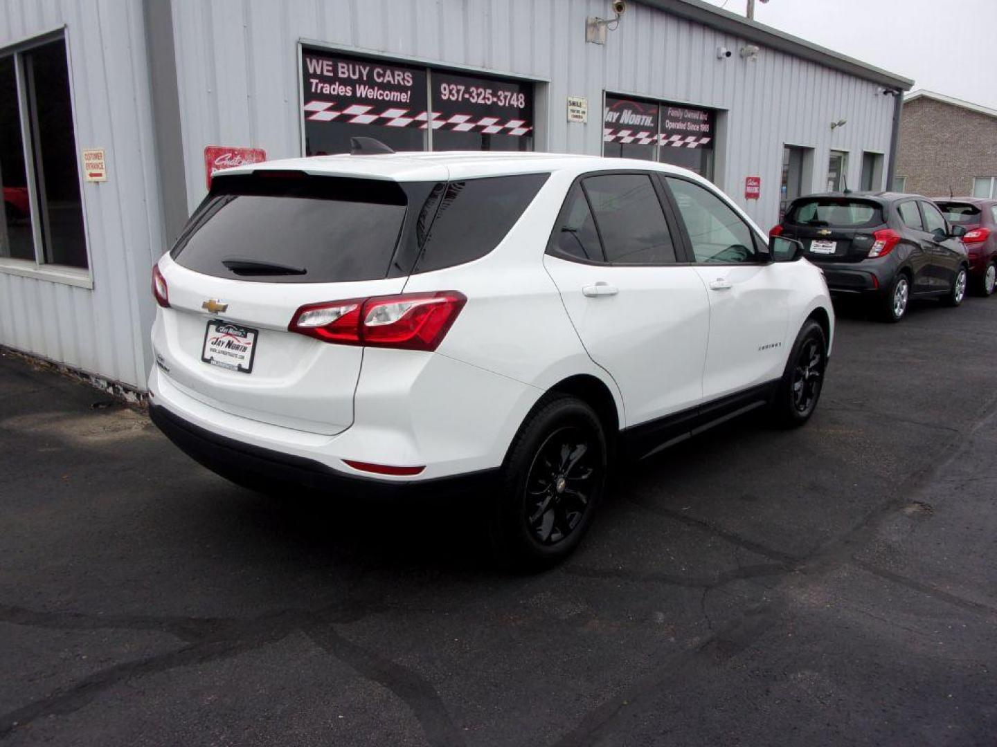 2020 WHITE CHEVROLET EQUINOX LS (2GNAXHEV0L6) with an 1.5L engine, Automatic transmission, located at 501 E. Columbia St., Springfield, OH, 45503, (800) 262-7122, 39.925262, -83.801796 - *** LS *** FWD *** Serviced and Detailed *** Power Seat *** Jay North Auto has offered hand picked vehicles since 1965! Our customer's enjoy a NO pressure buying experience with a small town feel. All of our vehicles get fully inspected and detailed. We are a preferred dealer for many local cred - Photo#3