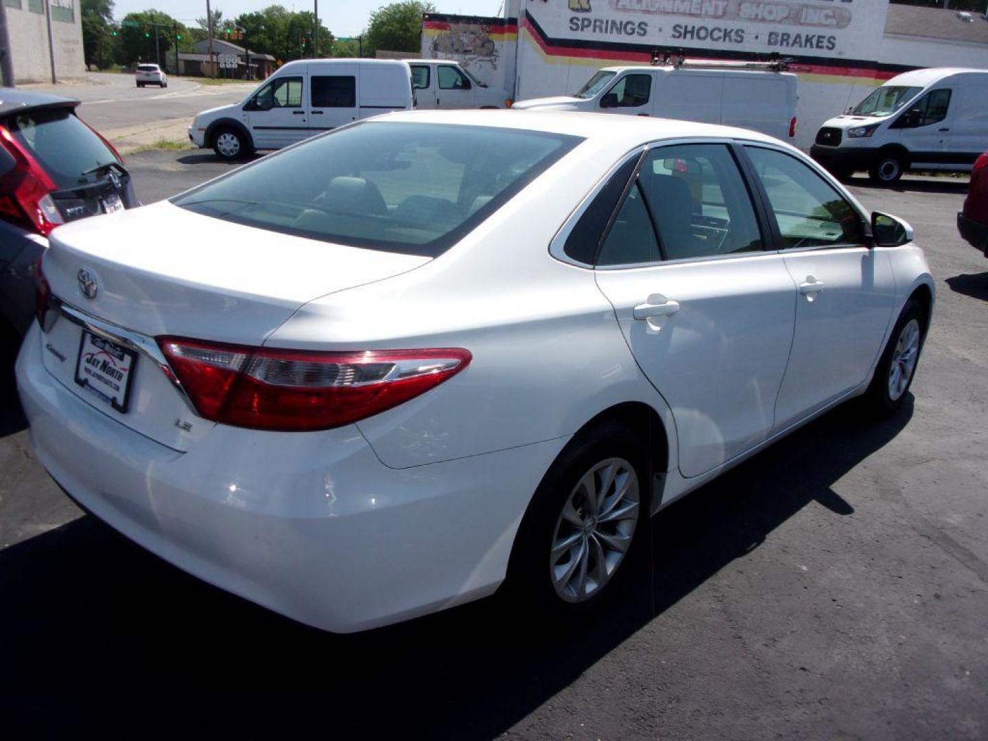 2017 WHITE TOYOTA CAMRY LE (4T1BF1FK1HU) with an 2.5L engine, Automatic transmission, located at 501 E. Columbia St., Springfield, OH, 45503, (800) 262-7122, 39.925262, -83.801796 - *** LE *** Serviced and Detailed *** Back Up Camera *** FWD *** Jay North Auto has offered hand picked vehicles since 1965! Our customer's enjoy a NO pressure buying experience with a small town feel. All of our vehicles get fully inspected and detailed. We are a preferred dealer for many local - Photo#4