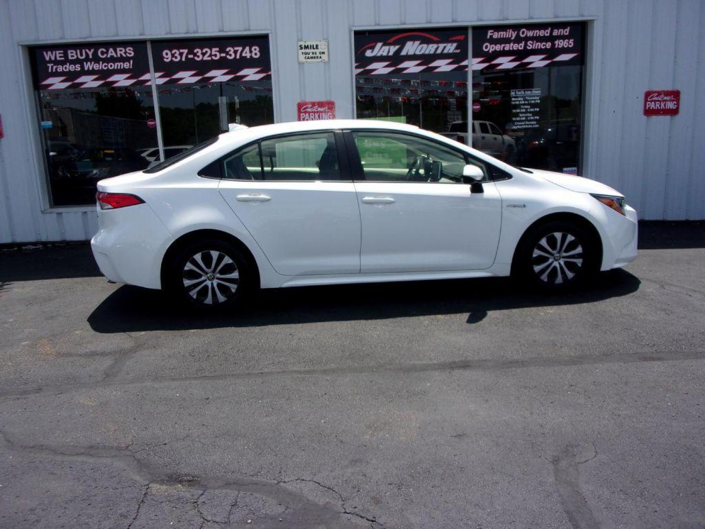 2020 WHITE TOYOTA COROLLA LE HYBRID (JTDEBRBE3LJ) with an 1.8L engine, Continuously Variable transmission, located at 501 E. Columbia St., Springfield, OH, 45503, (800) 262-7122, 39.925262, -83.801796 - ***1-Owner***Clean Carfax***New Tires***Hybrid***LE***Serviced and Detailed*** Jay North Auto has offered hand picked vehicles since 1965! Our customer's enjoy a NO pressure buying experience with a small town feel. All of our vehicles get fully inspected and detailed. We are a preferred dealer - Photo#0