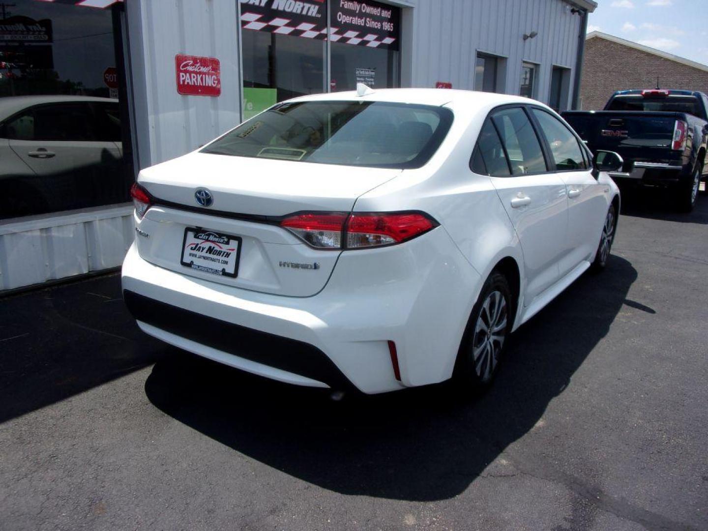 2020 WHITE TOYOTA COROLLA LE HYBRID (JTDEBRBE3LJ) with an 1.8L engine, Continuously Variable transmission, located at 501 E. Columbia St., Springfield, OH, 45503, (800) 262-7122, 39.925262, -83.801796 - ***1-Owner***Clean Carfax***New Tires***Hybrid***LE***Serviced and Detailed*** Jay North Auto has offered hand picked vehicles since 1965! Our customer's enjoy a NO pressure buying experience with a small town feel. All of our vehicles get fully inspected and detailed. We are a preferred dealer - Photo#3