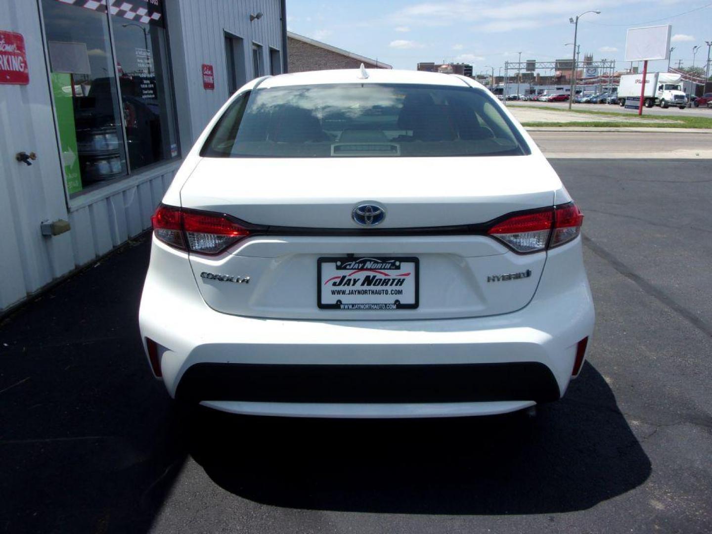 2020 WHITE TOYOTA COROLLA LE HYBRID (JTDEBRBE3LJ) with an 1.8L engine, Continuously Variable transmission, located at 501 E. Columbia St., Springfield, OH, 45503, (800) 262-7122, 39.925262, -83.801796 - ***1-Owner***Clean Carfax***New Tires***Hybrid***LE***Serviced and Detailed*** Jay North Auto has offered hand picked vehicles since 1965! Our customer's enjoy a NO pressure buying experience with a small town feel. All of our vehicles get fully inspected and detailed. We are a preferred dealer - Photo#4