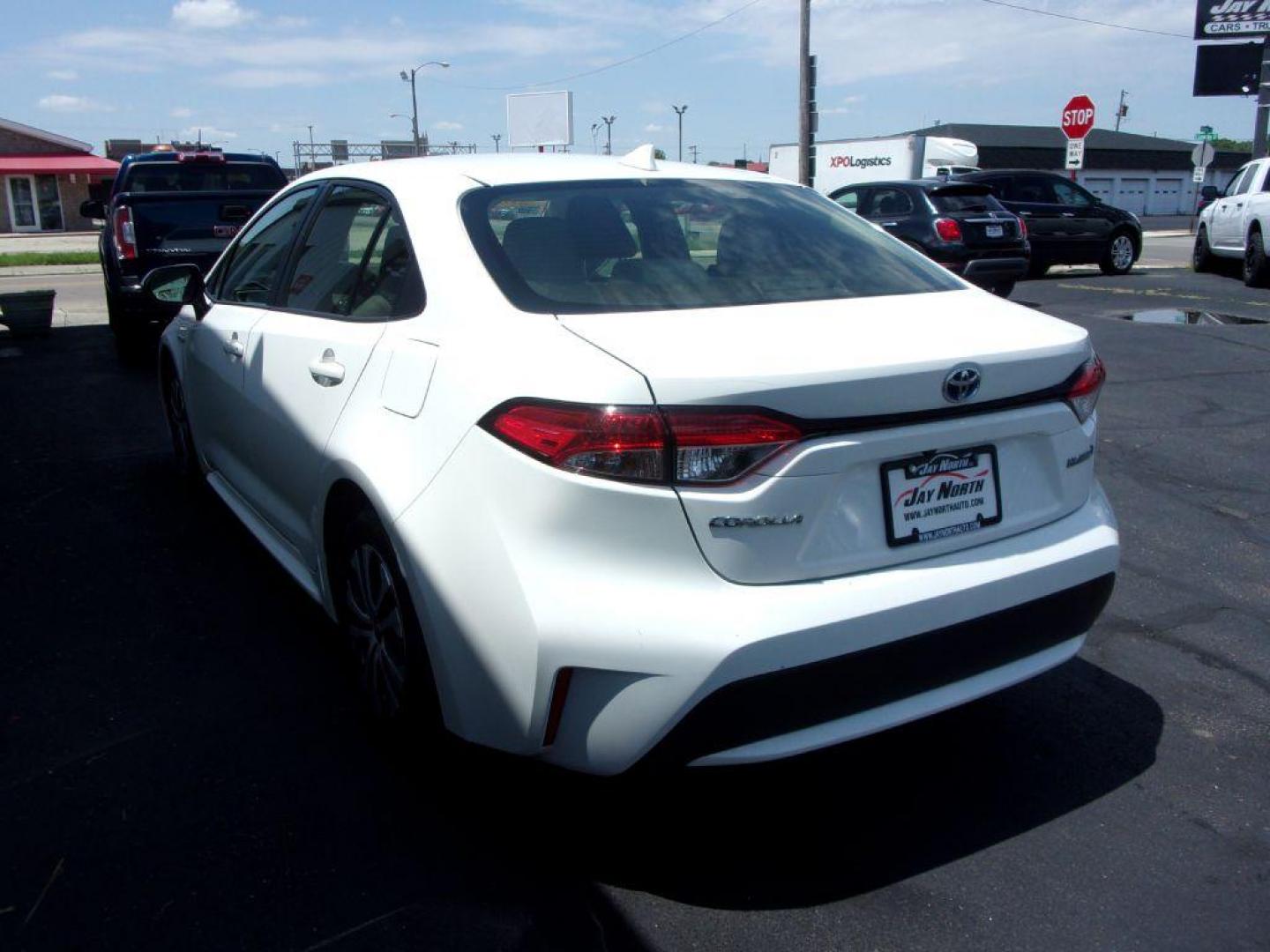 2020 WHITE TOYOTA COROLLA LE HYBRID (JTDEBRBE3LJ) with an 1.8L engine, Continuously Variable transmission, located at 501 E. Columbia St., Springfield, OH, 45503, (800) 262-7122, 39.925262, -83.801796 - ***1-Owner***Clean Carfax***New Tires***Hybrid***LE***Serviced and Detailed*** Jay North Auto has offered hand picked vehicles since 1965! Our customer's enjoy a NO pressure buying experience with a small town feel. All of our vehicles get fully inspected and detailed. We are a preferred dealer - Photo#5