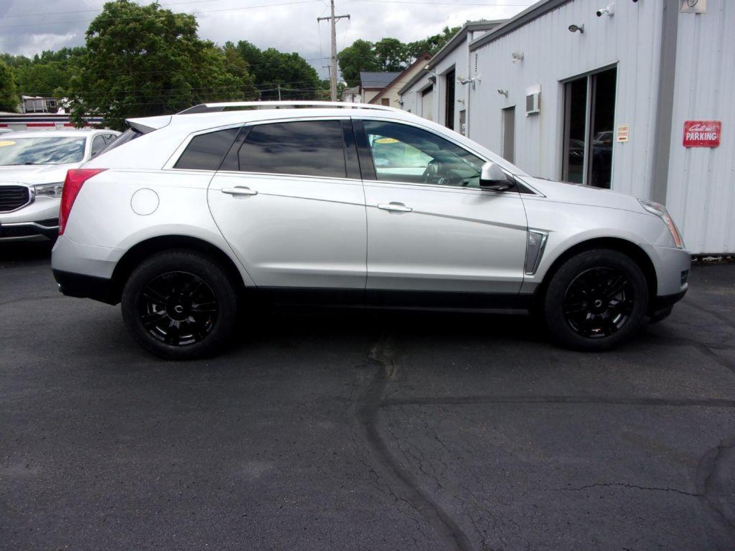 2016 SILVER CADILLAC SRX LUXURY COLLECTION (3GYFNBE33GS) with an 3.6L engine, Automatic transmission, located at 501 E. Columbia St., Springfield, OH, 45503, (800) 262-7122, 39.925262, -83.801796 - *** Serviced and Detailed *** FWD V6 *** Luxury Collection *** Moonroof *** Remote Start *** 22 Service Records on CarFax *** Jay North Auto has offered hand picked vehicles since 1965! Our customer's enjoy a NO pressure buying experience with a small town feel. All of our vehicles get fully in - Photo#0