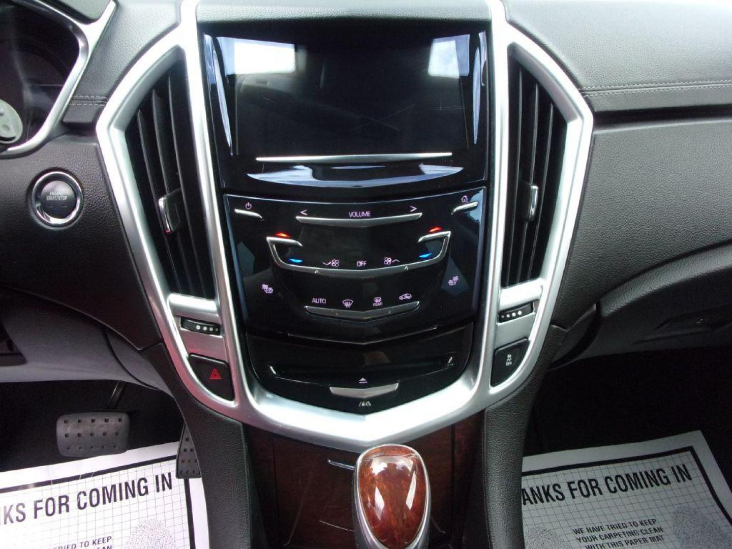 2016 SILVER CADILLAC SRX LUXURY COLLECTION (3GYFNBE33GS) with an 3.6L engine, Automatic transmission, located at 501 E. Columbia St., Springfield, OH, 45503, (800) 262-7122, 39.925262, -83.801796 - *** Serviced and Detailed *** FWD V6 *** Luxury Collection *** Moonroof *** Remote Start *** 22 Service Records on CarFax *** Jay North Auto has offered hand picked vehicles since 1965! Our customer's enjoy a NO pressure buying experience with a small town feel. All of our vehicles get fully in - Photo#10