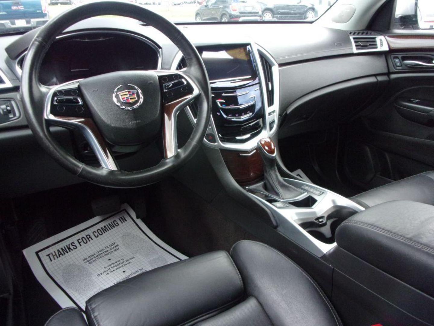 2016 SILVER CADILLAC SRX LUXURY COLLECTION (3GYFNBE33GS) with an 3.6L engine, Automatic transmission, located at 501 E. Columbia St., Springfield, OH, 45503, (800) 262-7122, 39.925262, -83.801796 - *** Serviced and Detailed *** FWD V6 *** Luxury Collection *** Moonroof *** Remote Start *** 22 Service Records on CarFax *** Jay North Auto has offered hand picked vehicles since 1965! Our customer's enjoy a NO pressure buying experience with a small town feel. All of our vehicles get fully in - Photo#13