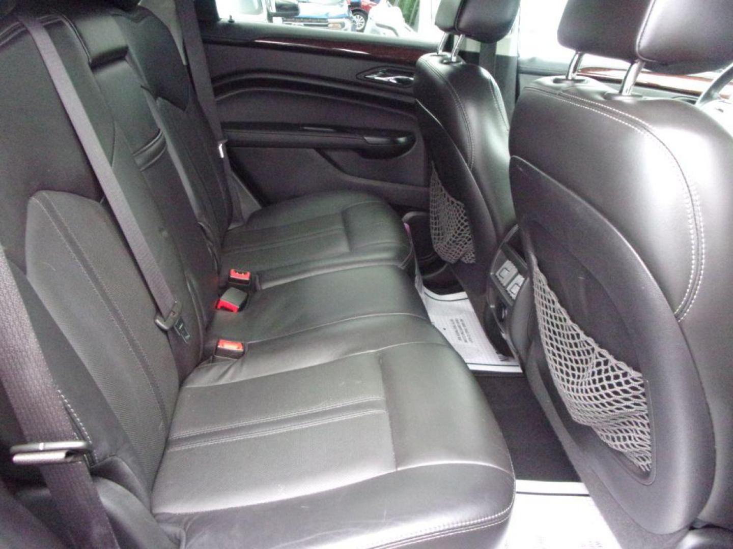 2016 SILVER CADILLAC SRX LUXURY COLLECTION (3GYFNBE33GS) with an 3.6L engine, Automatic transmission, located at 501 E. Columbia St., Springfield, OH, 45503, (800) 262-7122, 39.925262, -83.801796 - *** Serviced and Detailed *** FWD V6 *** Luxury Collection *** Moonroof *** Remote Start *** 22 Service Records on CarFax *** Jay North Auto has offered hand picked vehicles since 1965! Our customer's enjoy a NO pressure buying experience with a small town feel. All of our vehicles get fully in - Photo#19