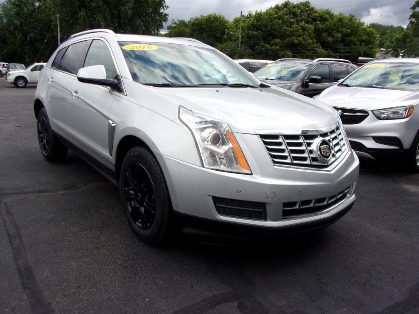 2016 SILVER CADILLAC SRX LUXURY COLLECTION (3GYFNBE33GS) with an 3.6L engine, Automatic transmission, located at 501 E. Columbia St., Springfield, OH, 45503, (800) 262-7122, 39.925262, -83.801796 - *** Serviced and Detailed *** FWD V6 *** Luxury Collection *** Moonroof *** Remote Start *** 22 Service Records on CarFax *** Jay North Auto has offered hand picked vehicles since 1965! Our customer's enjoy a NO pressure buying experience with a small town feel. All of our vehicles get fully in - Photo#2