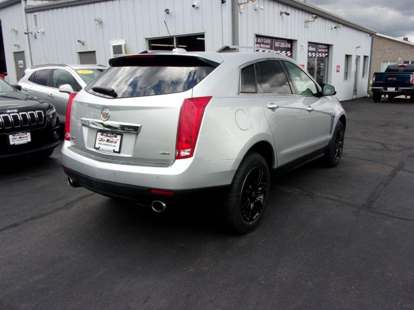 2016 SILVER CADILLAC SRX LUXURY COLLECTION (3GYFNBE33GS) with an 3.6L engine, Automatic transmission, located at 501 E. Columbia St., Springfield, OH, 45503, (800) 262-7122, 39.925262, -83.801796 - *** Serviced and Detailed *** FWD V6 *** Luxury Collection *** Moonroof *** Remote Start *** 22 Service Records on CarFax *** Jay North Auto has offered hand picked vehicles since 1965! Our customer's enjoy a NO pressure buying experience with a small town feel. All of our vehicles get fully in - Photo#3