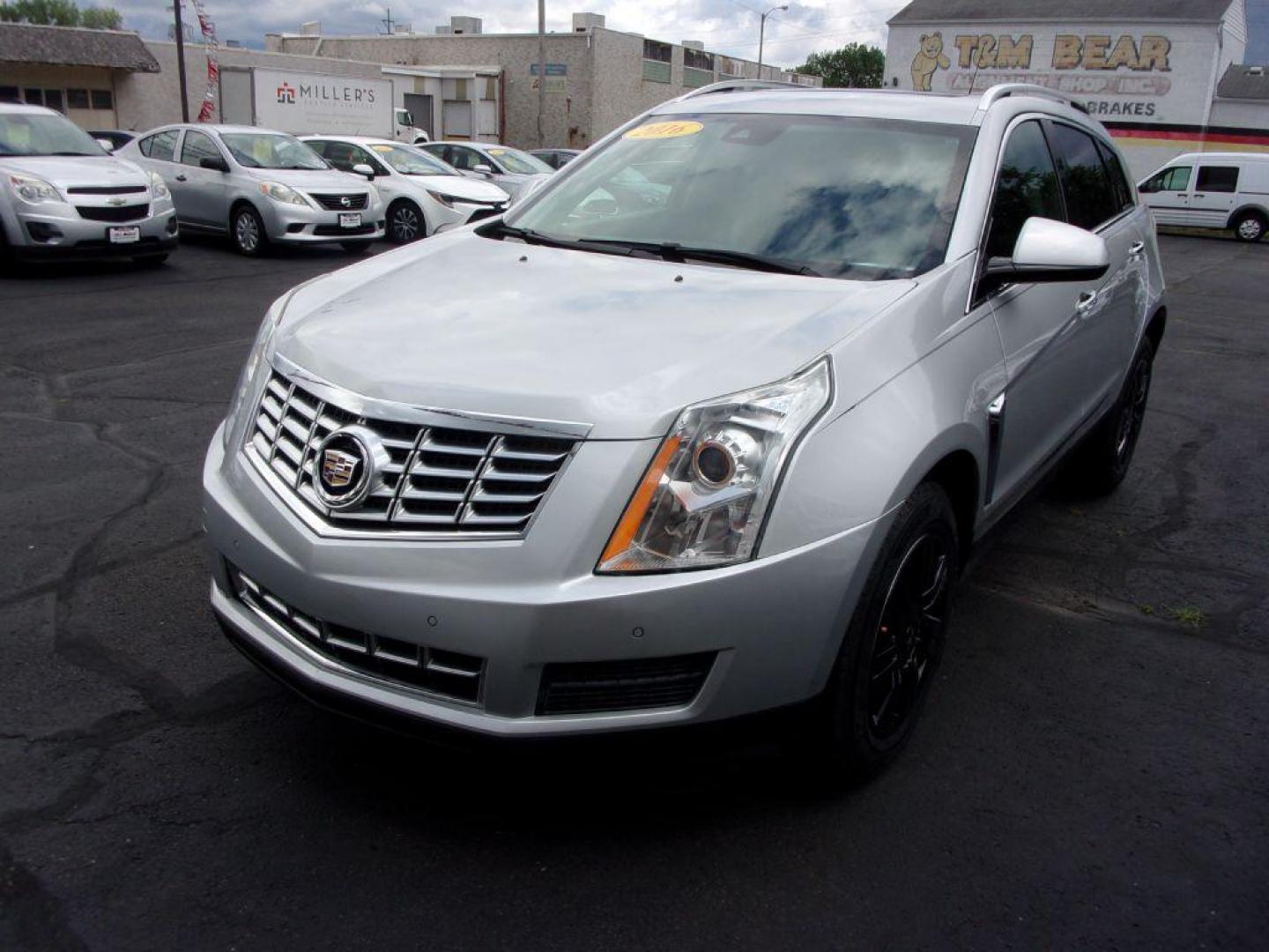 2016 SILVER CADILLAC SRX LUXURY COLLECTION (3GYFNBE33GS) with an 3.6L engine, Automatic transmission, located at 501 E. Columbia St., Springfield, OH, 45503, (800) 262-7122, 39.925262, -83.801796 - *** Serviced and Detailed *** FWD V6 *** Luxury Collection *** Moonroof *** Remote Start *** 22 Service Records on CarFax *** Jay North Auto has offered hand picked vehicles since 1965! Our customer's enjoy a NO pressure buying experience with a small town feel. All of our vehicles get fully in - Photo#6