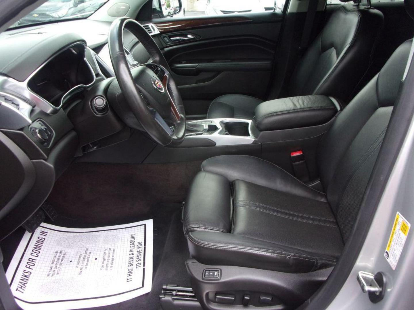 2016 SILVER CADILLAC SRX LUXURY COLLECTION (3GYFNBE33GS) with an 3.6L engine, Automatic transmission, located at 501 E. Columbia St., Springfield, OH, 45503, (800) 262-7122, 39.925262, -83.801796 - *** Serviced and Detailed *** FWD V6 *** Luxury Collection *** Moonroof *** Remote Start *** 22 Service Records on CarFax *** Jay North Auto has offered hand picked vehicles since 1965! Our customer's enjoy a NO pressure buying experience with a small town feel. All of our vehicles get fully in - Photo#8