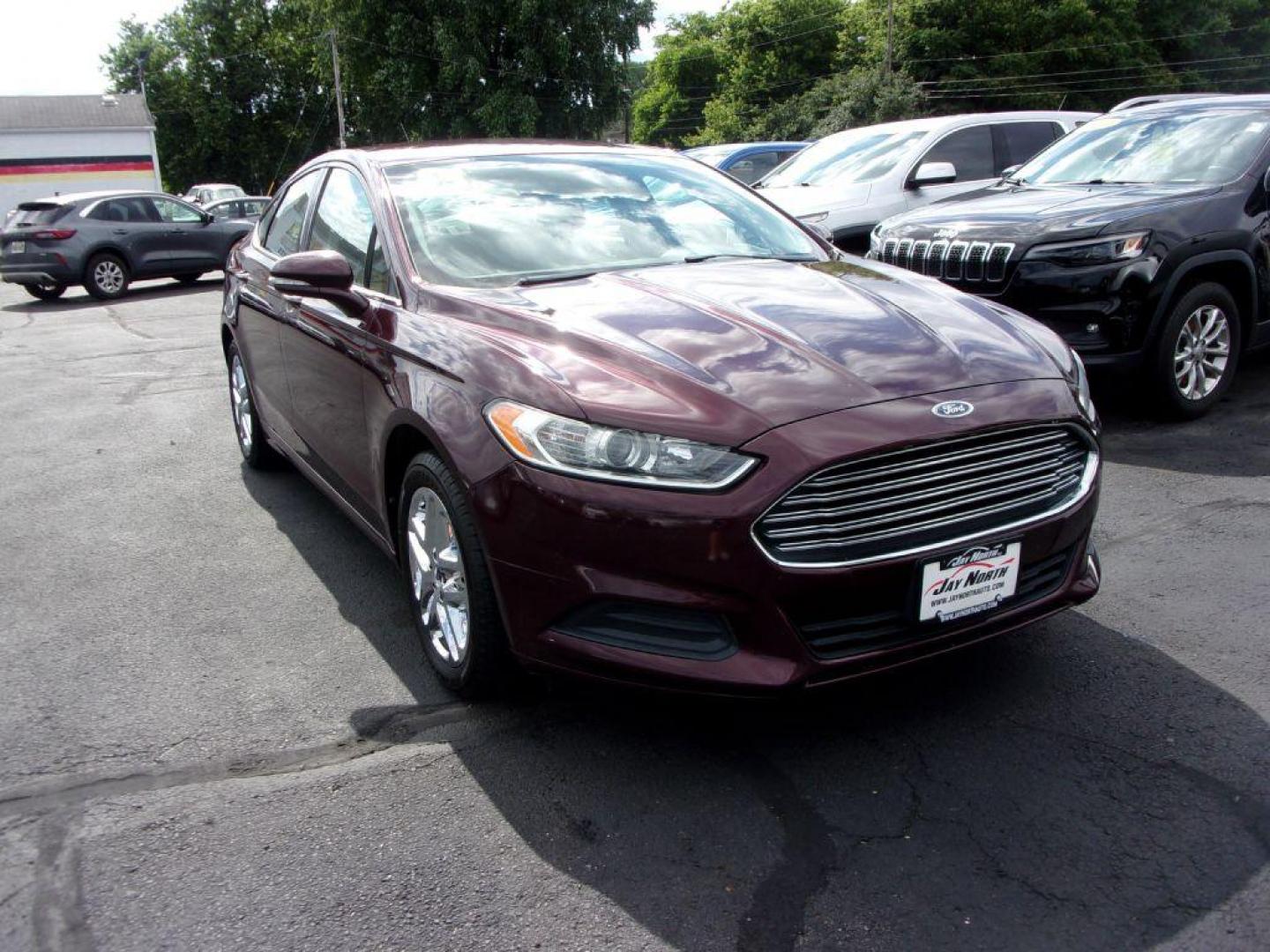 2013 RED FORD FUSION SE (3FA6P0H77DR) with an 2.5L engine, Automatic transmission, located at 501 E. Columbia St., Springfield, OH, 45503, (800) 262-7122, 39.925262, -83.801796 - ***Clean Carfax***New Front and Rear Pads and Rotors***New Suspention Parts***SE***2.5L***Serviced and Detailed*** - Photo#2